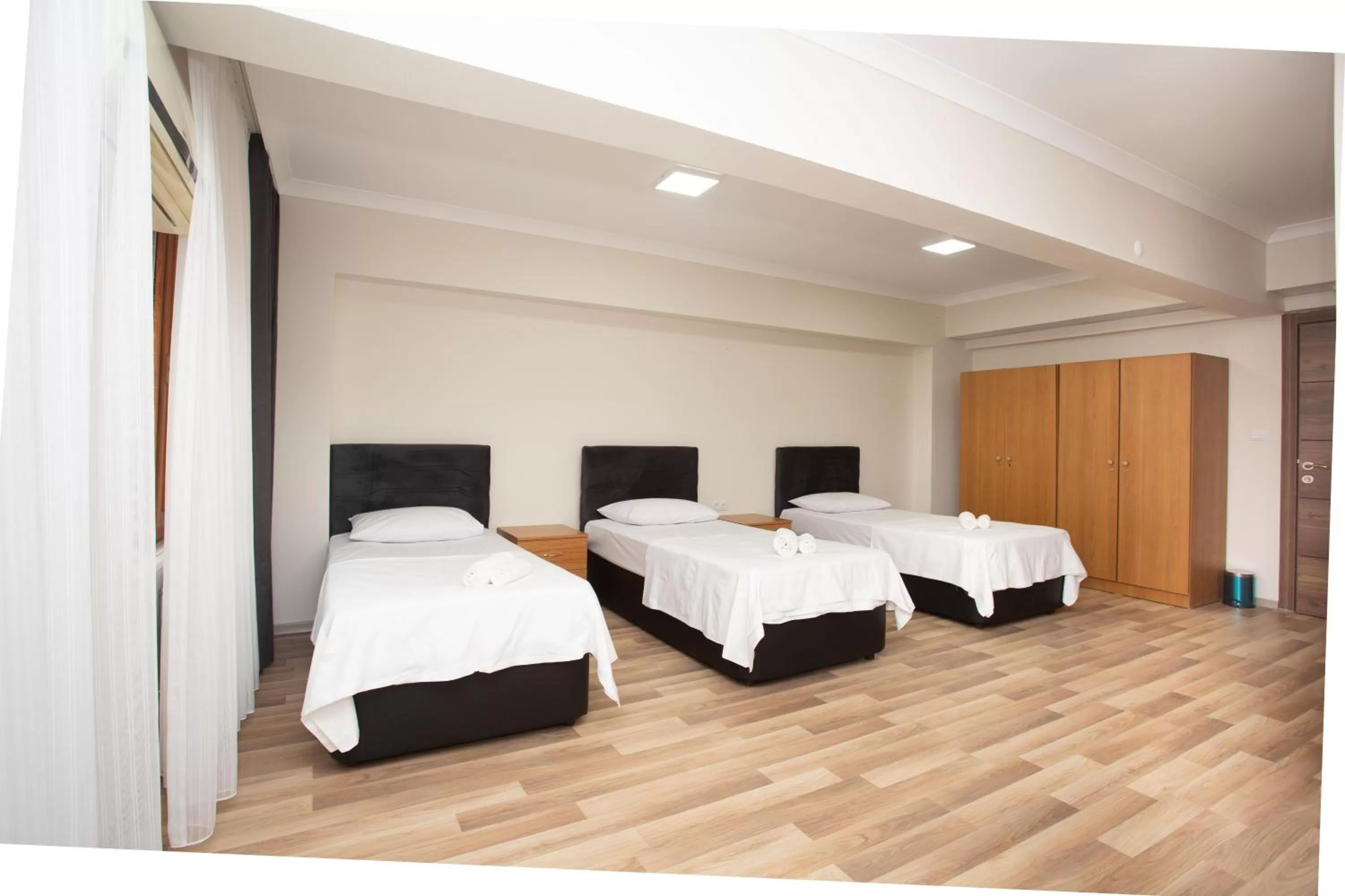 Bed in Türkler Suite Hotel