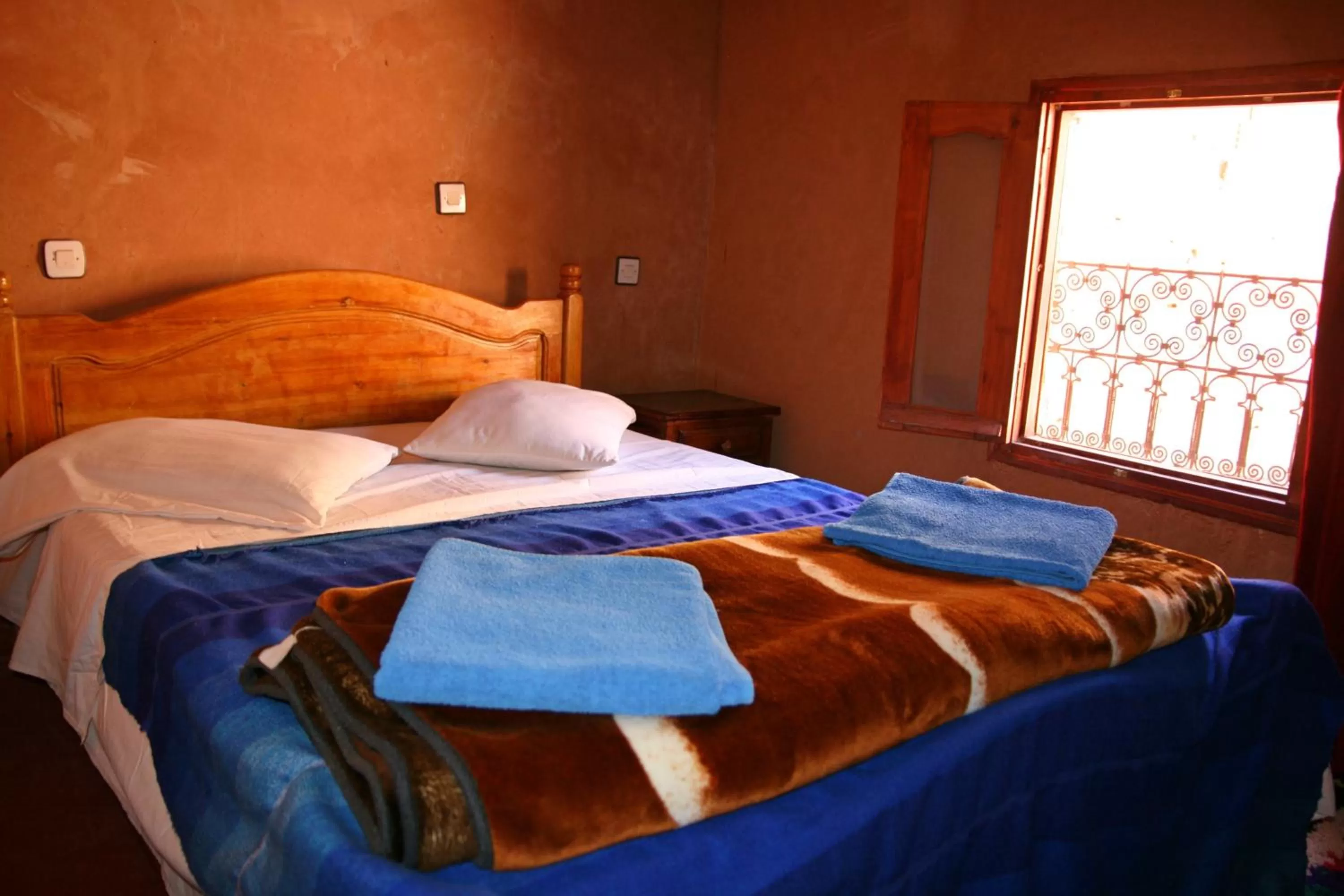 Bed in Maison d'Hôte Valentine