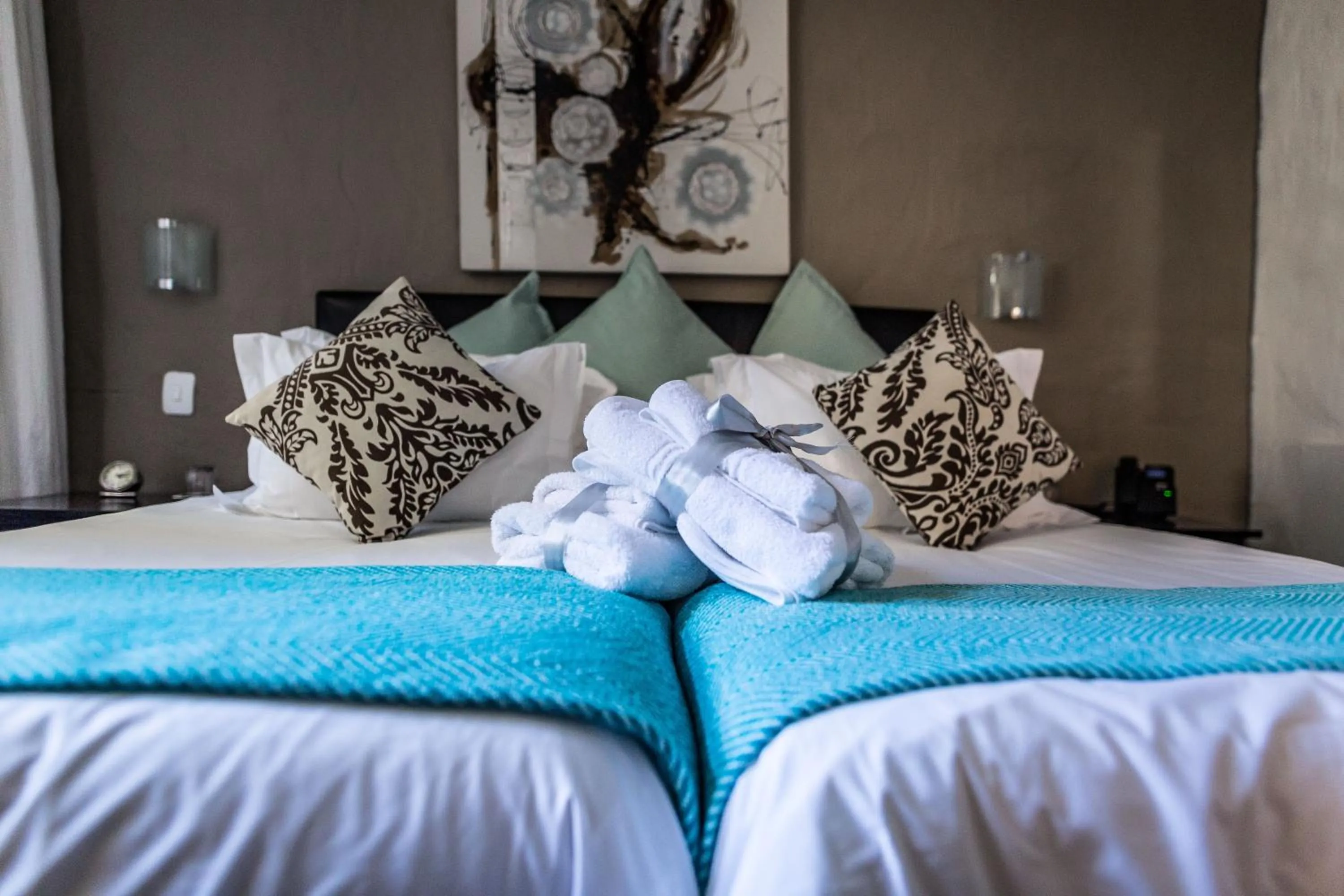 Bed in Point B Guest House -Sustainable Solar Energy