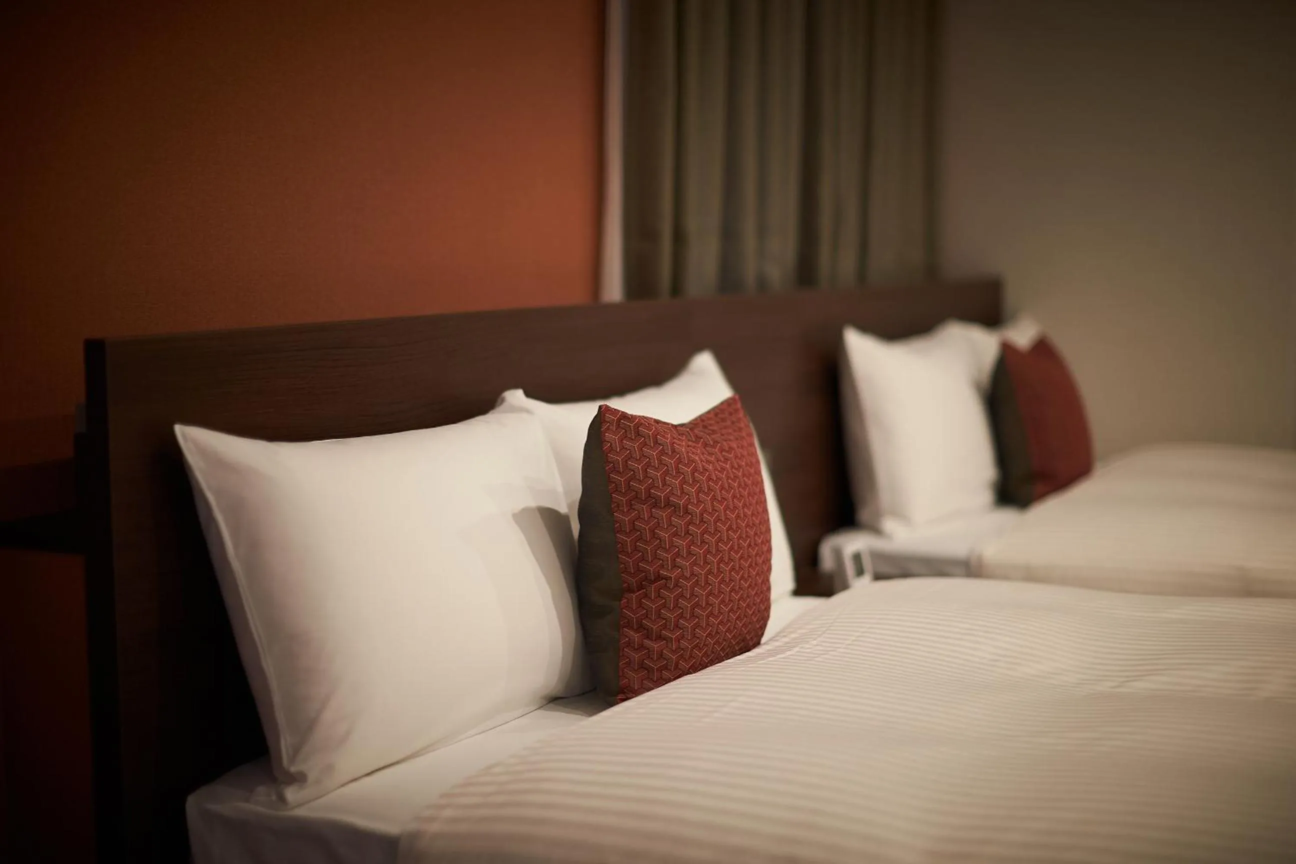 Bed in Y's Inn Naha Oroku Ekimae