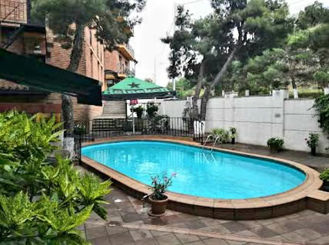 Swimming pool in Sani Apart Hotel