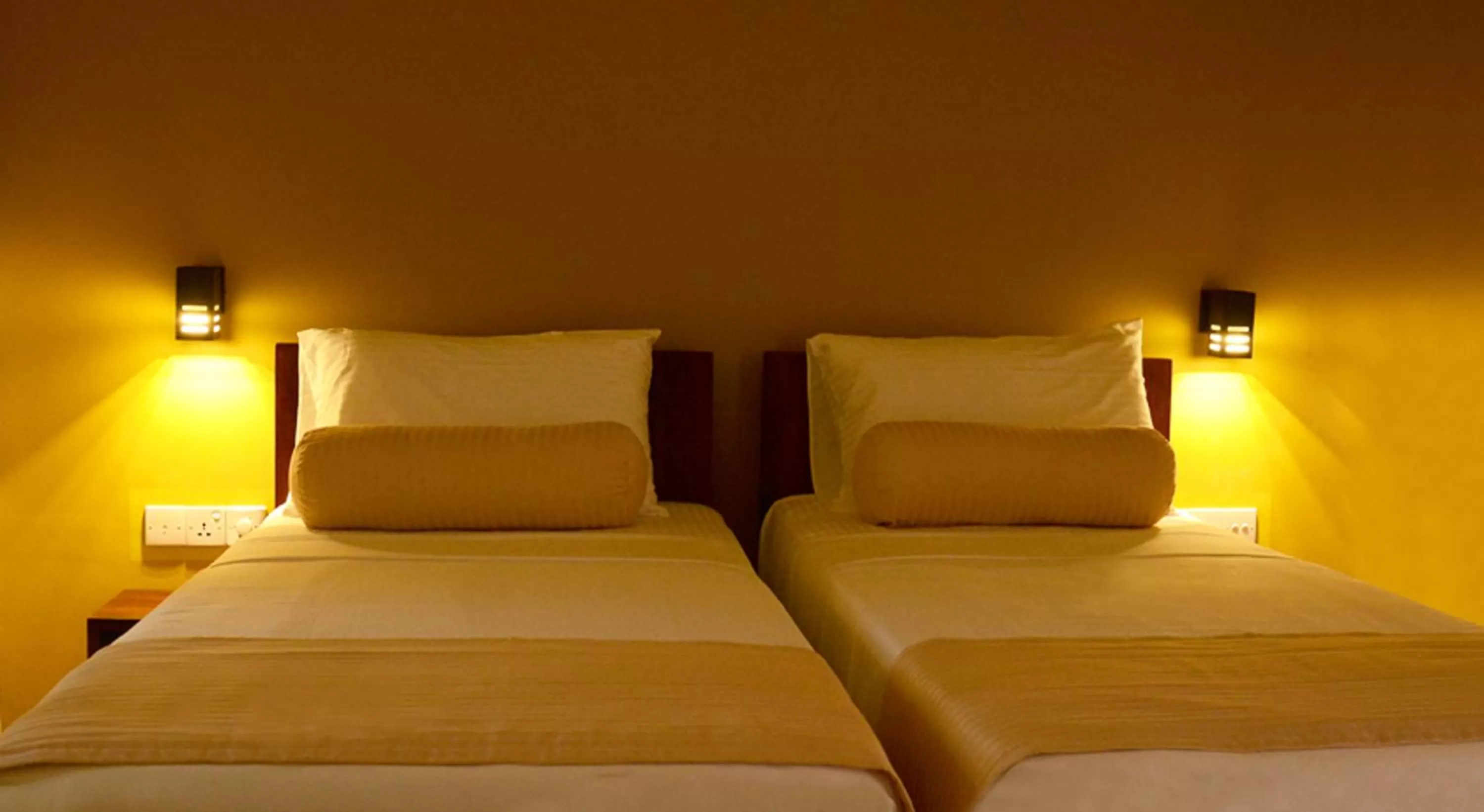 Bed in Inlak Garden Hotel