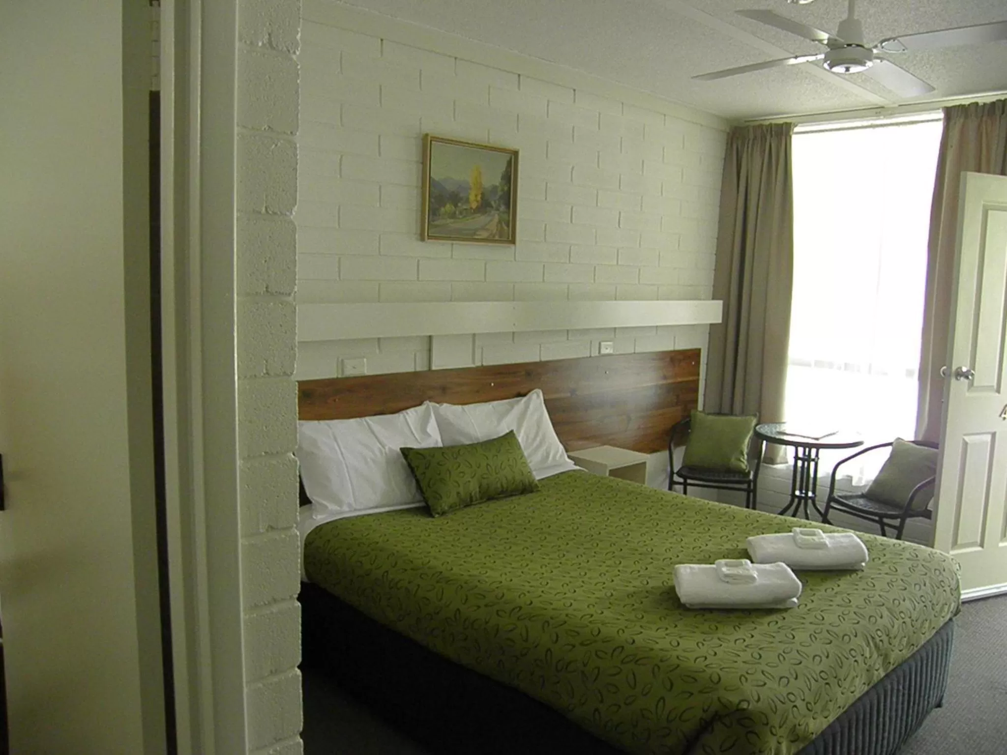 Bed in 7th Street Motel