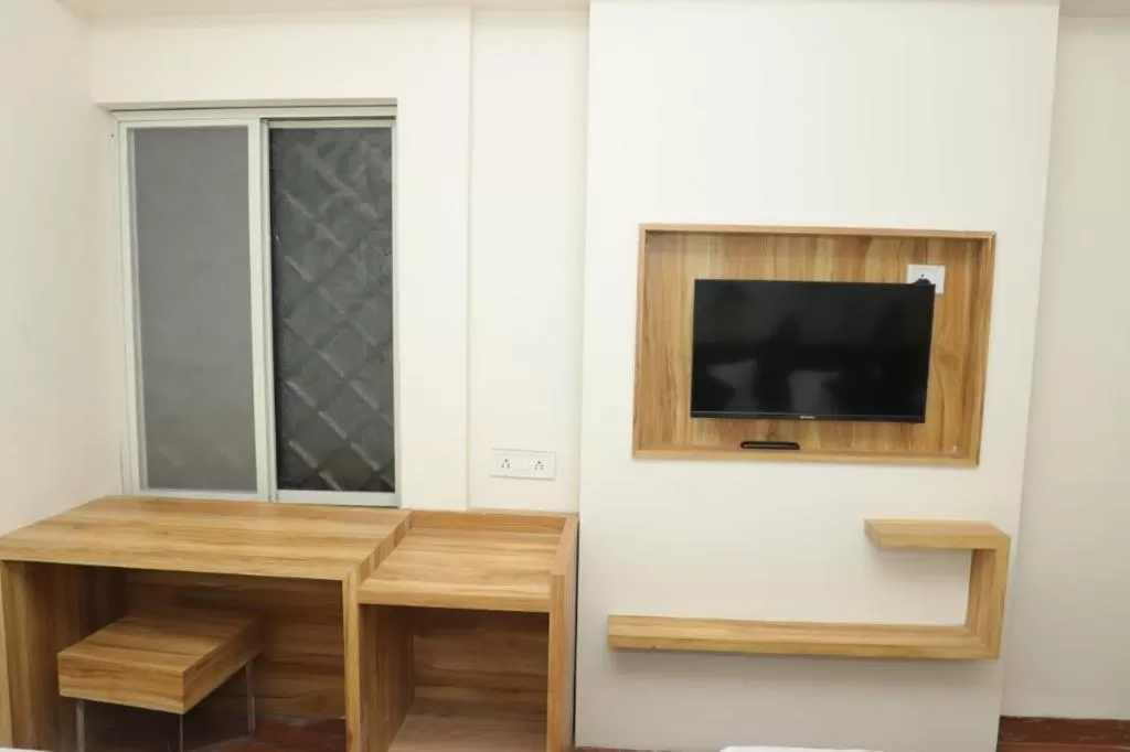 TV/Entertainment Center in Hotel shree mahakal krapa