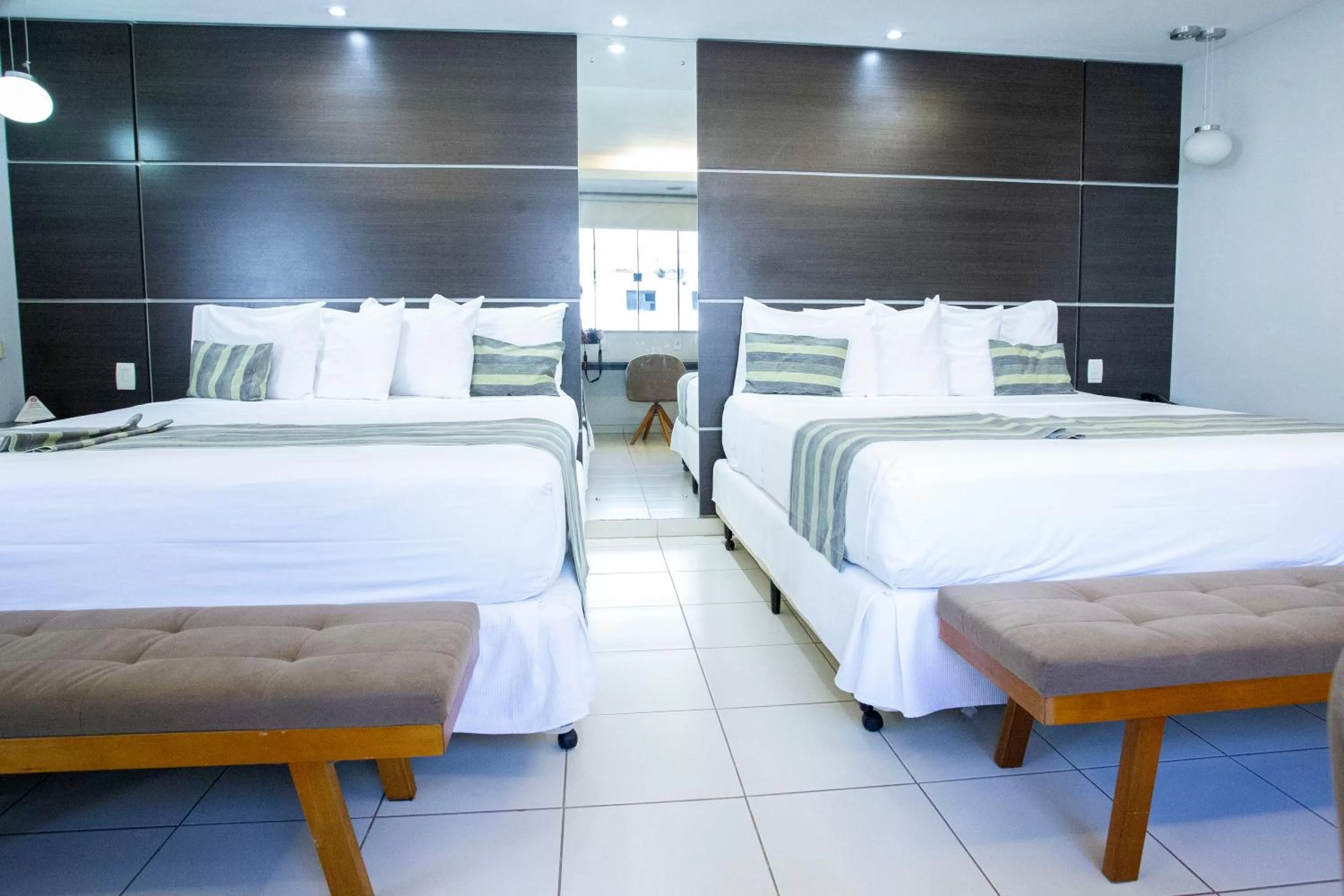 Bed in Atrium Confort Hotels