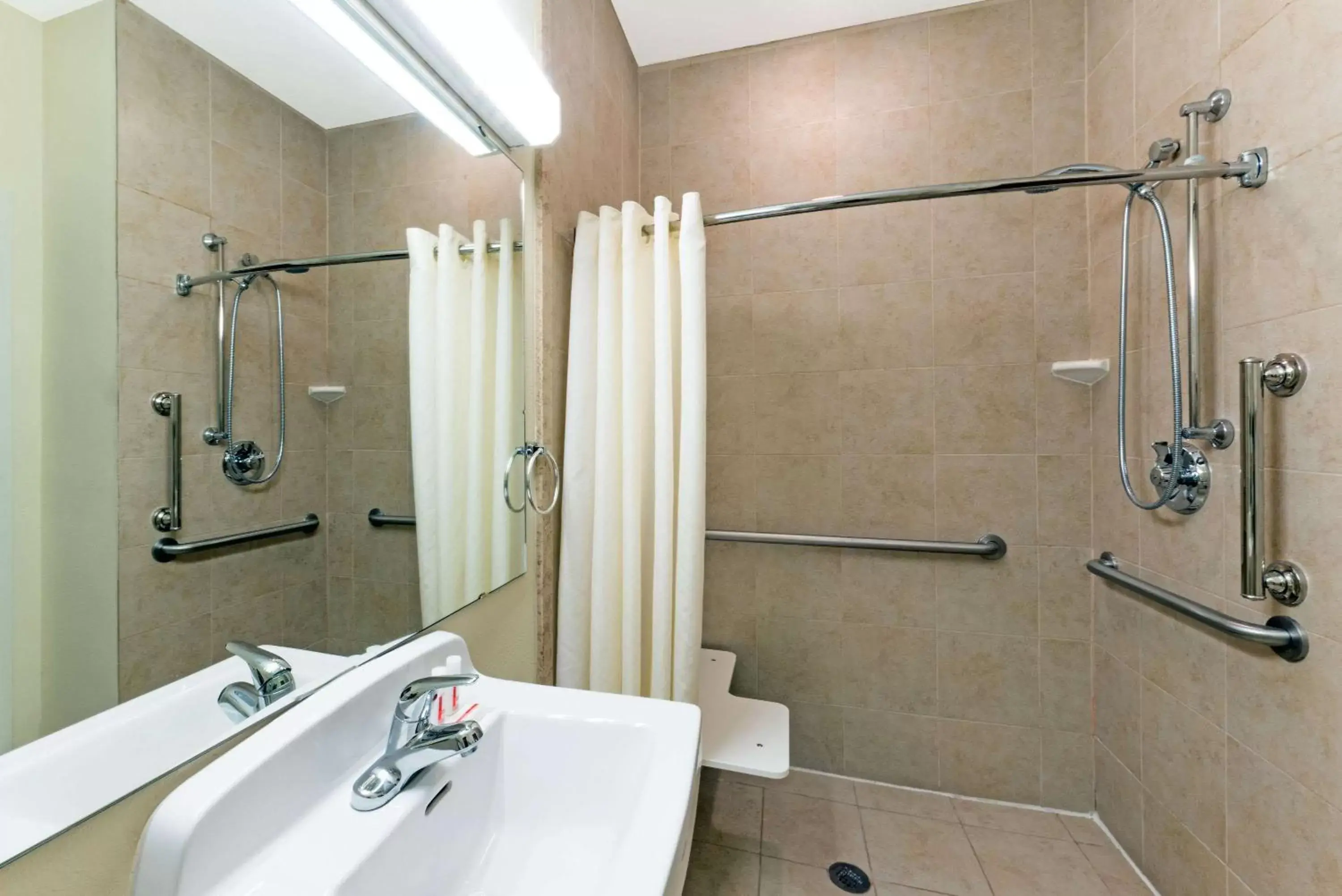 Queen Room with Roll-In Shower - Mobility/Hearing Accessible - Non-Smoking in Microtel Inn and Suites Eagle Pass Queen Room with Roll-In Shower - Mobility/Hearing Accessible - Non-Smoking in Microtel Inn and Suites Eagle Pass