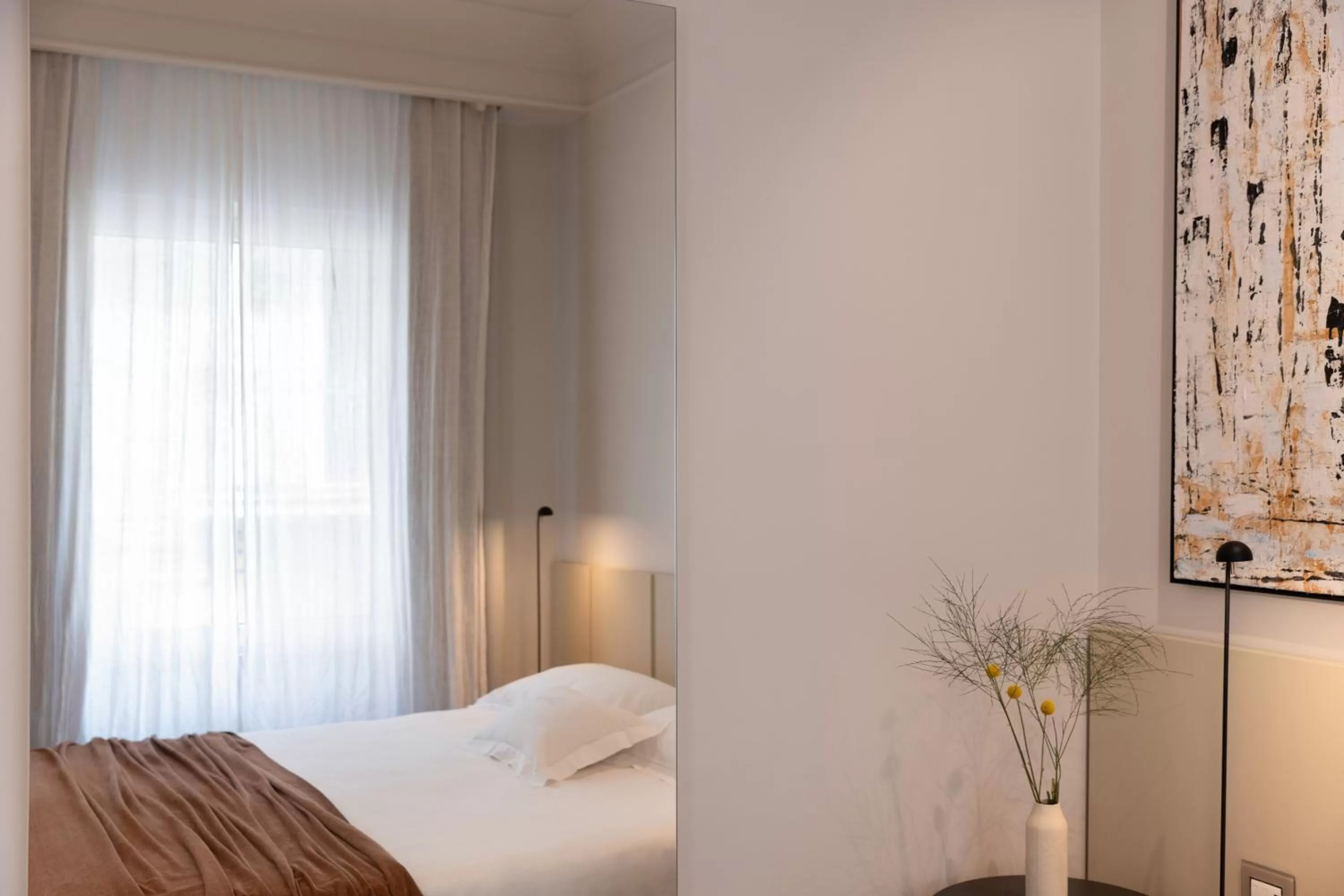 Bed in Taodomus Boutique Hotel