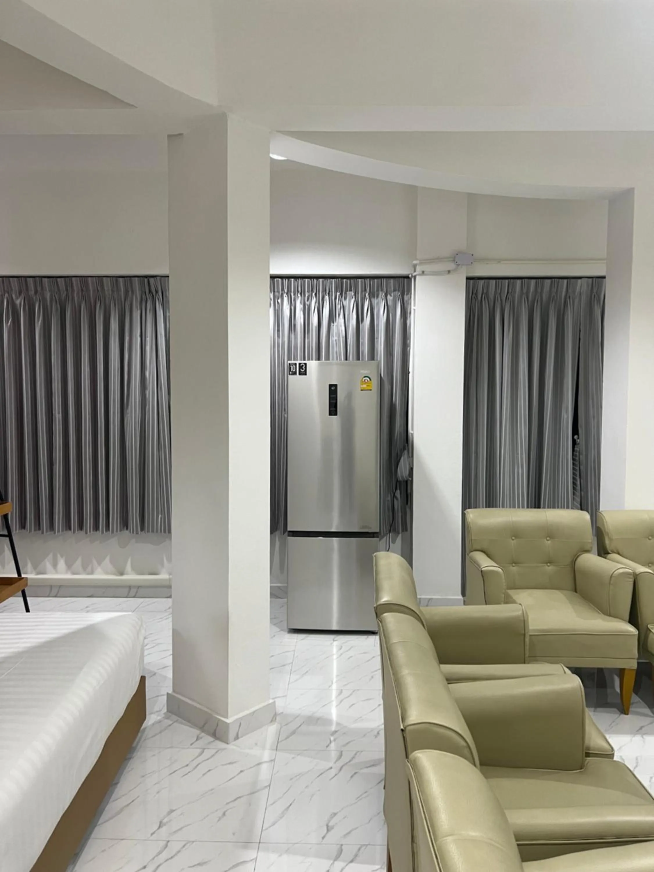 Bed in Mall Suites Hotel