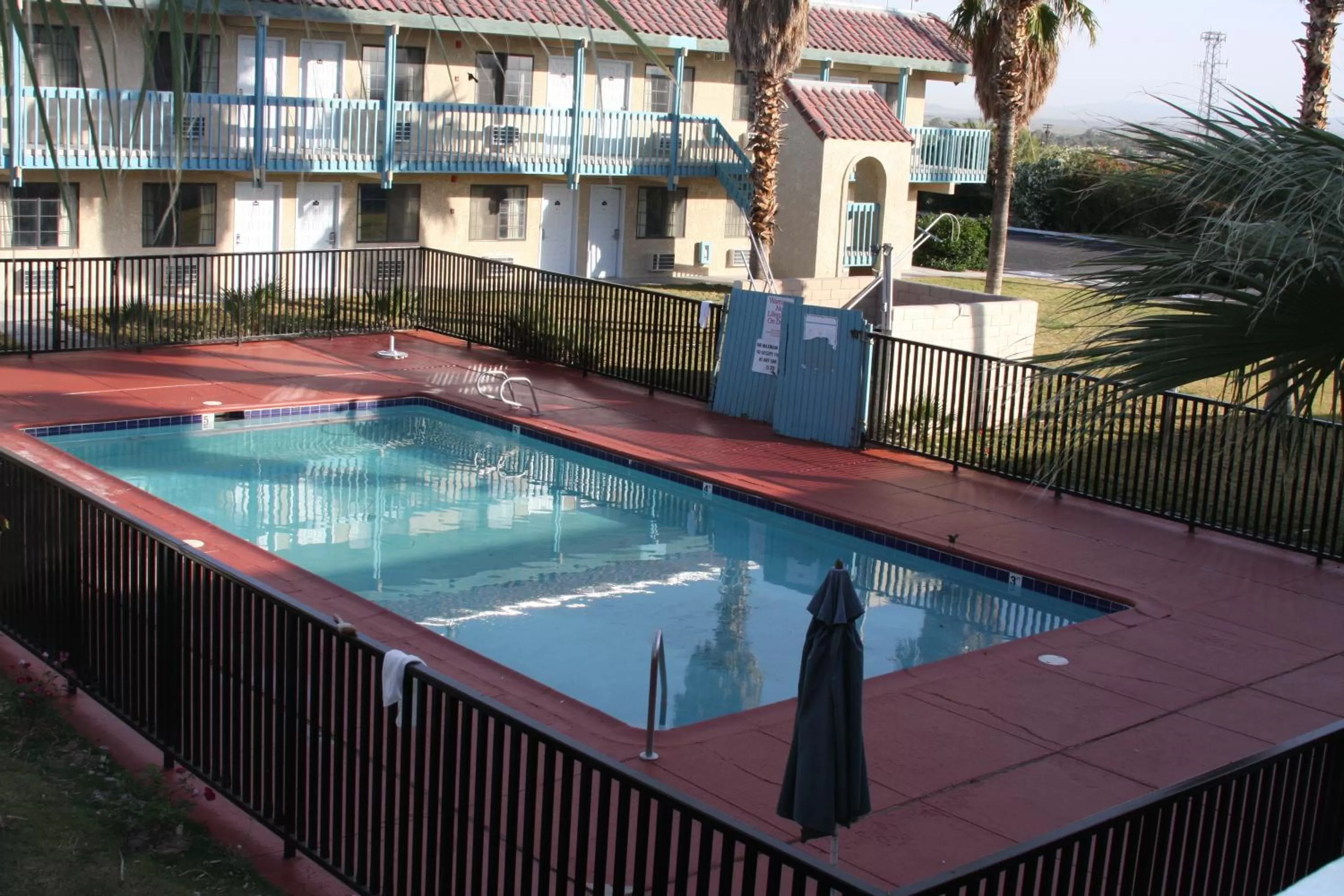Swimming pool in Days Inn & Suites by Wyndham Needles