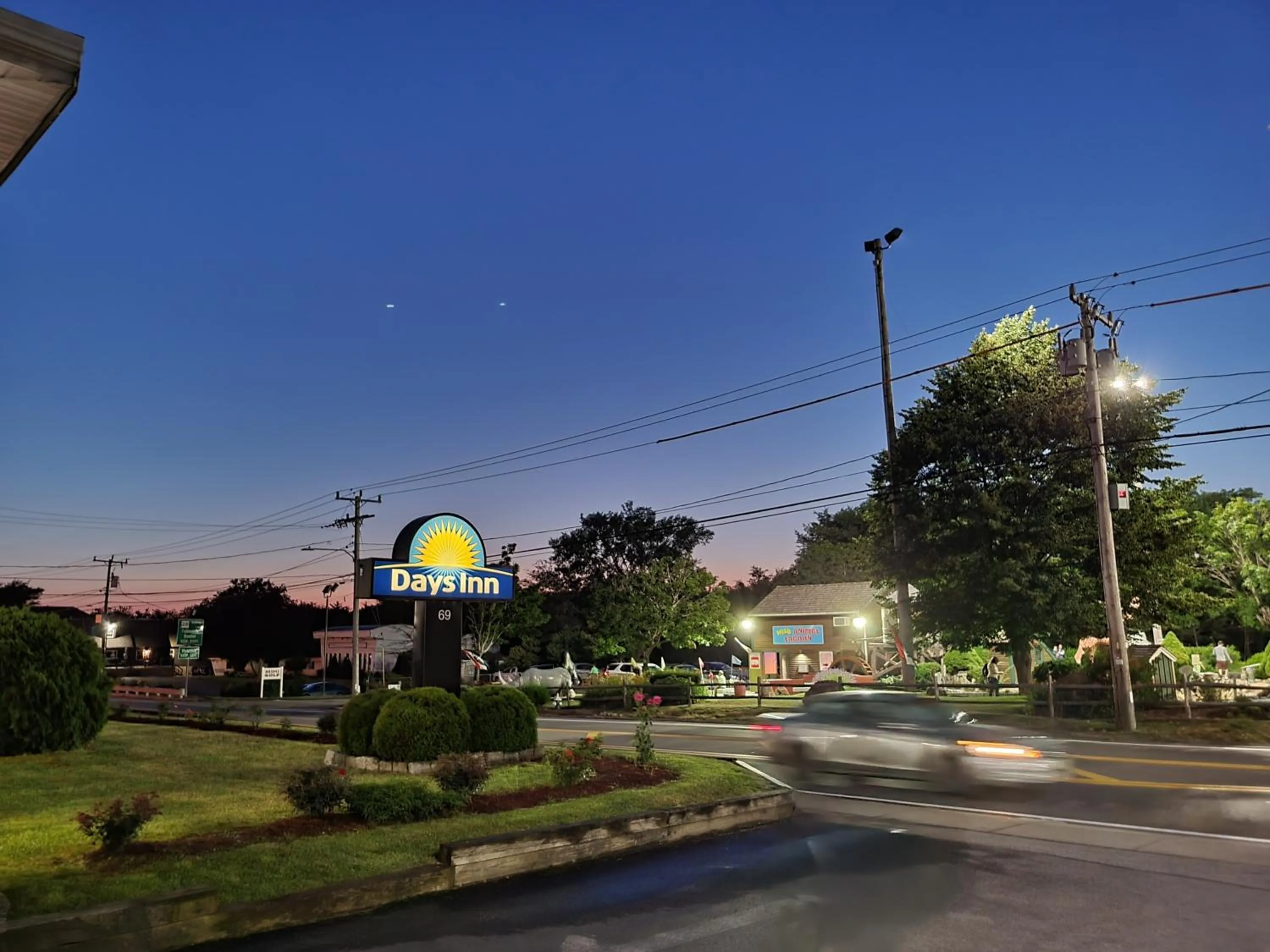 Property logo or sign in Days Inn by Wyndham - Cape Cod