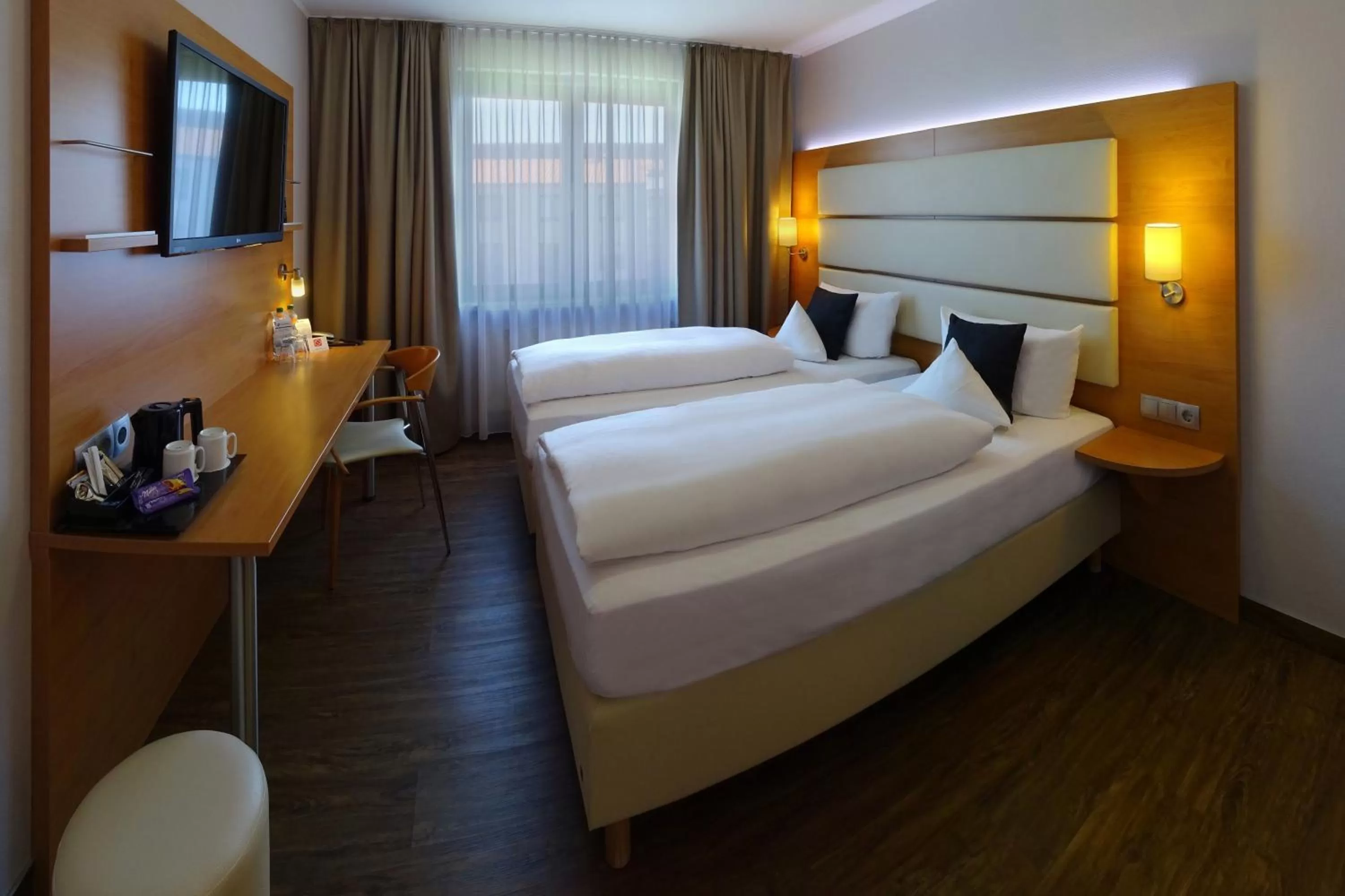 Photo of the whole room, Bed in Best Western Hotel Braunschweig