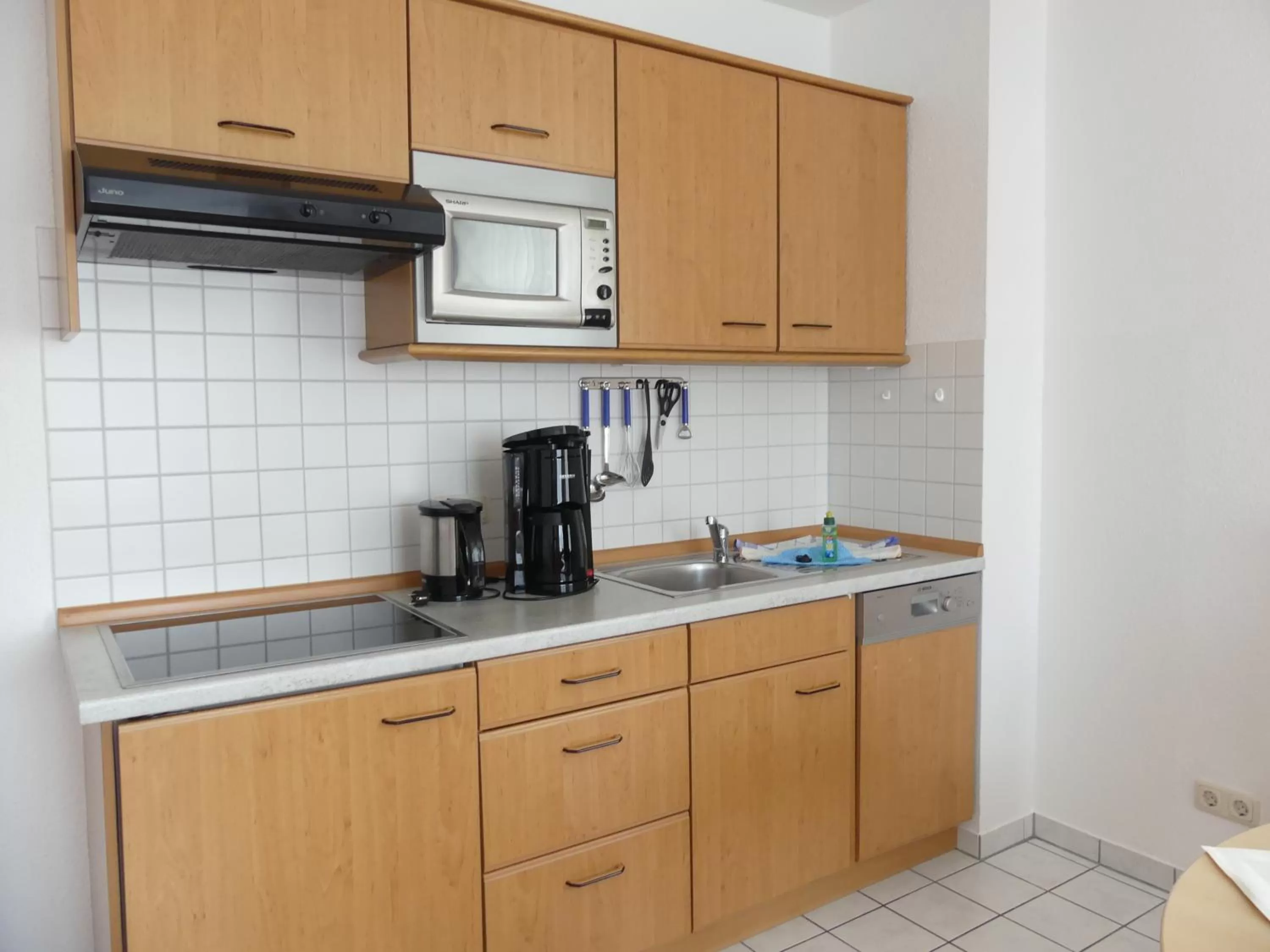 Kitchen or kitchenette, Kitchen/Kitchenette in Apartmenthaus Binzer Sterne