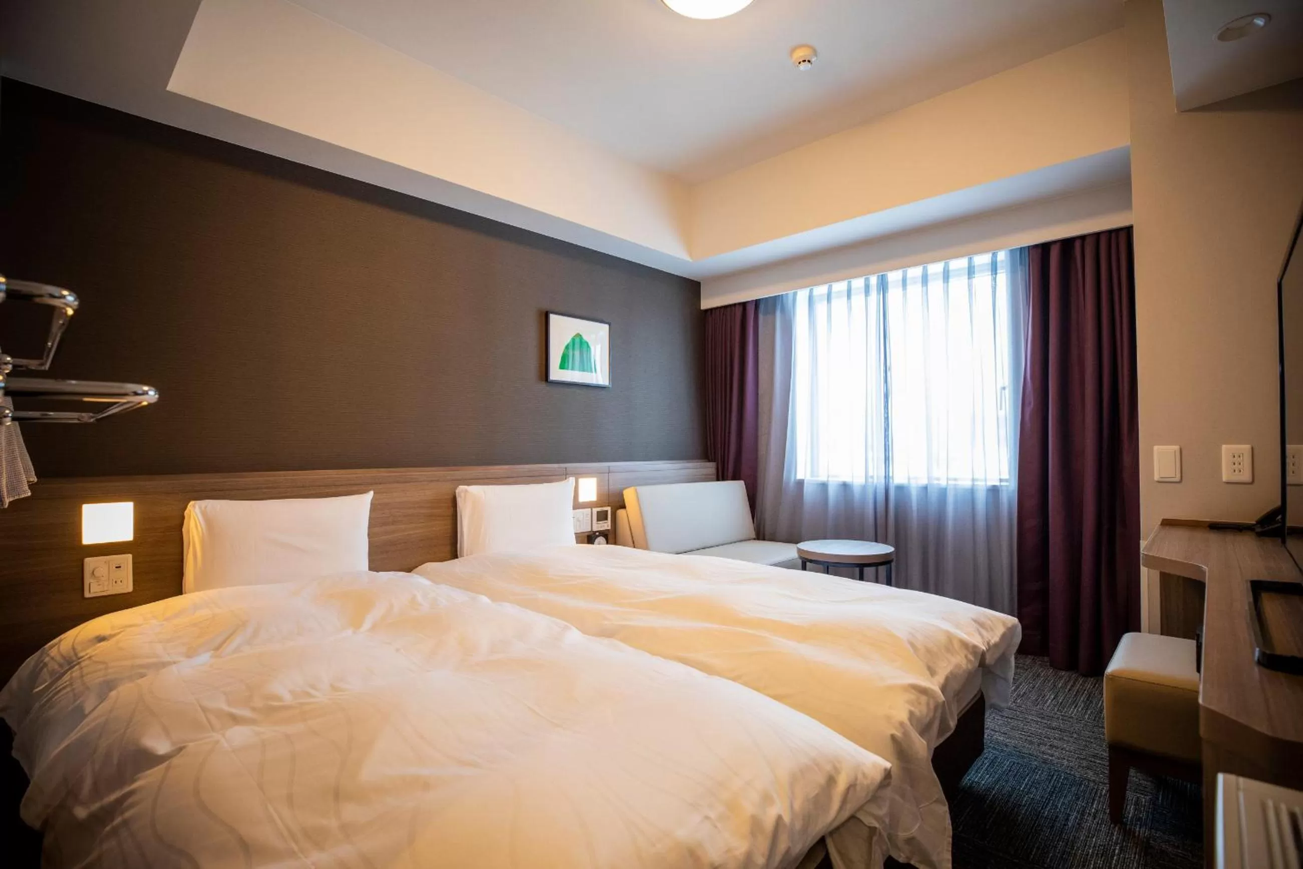 Photo of the whole room, Bed in La Vista Furano Hills Natural Hot Spring