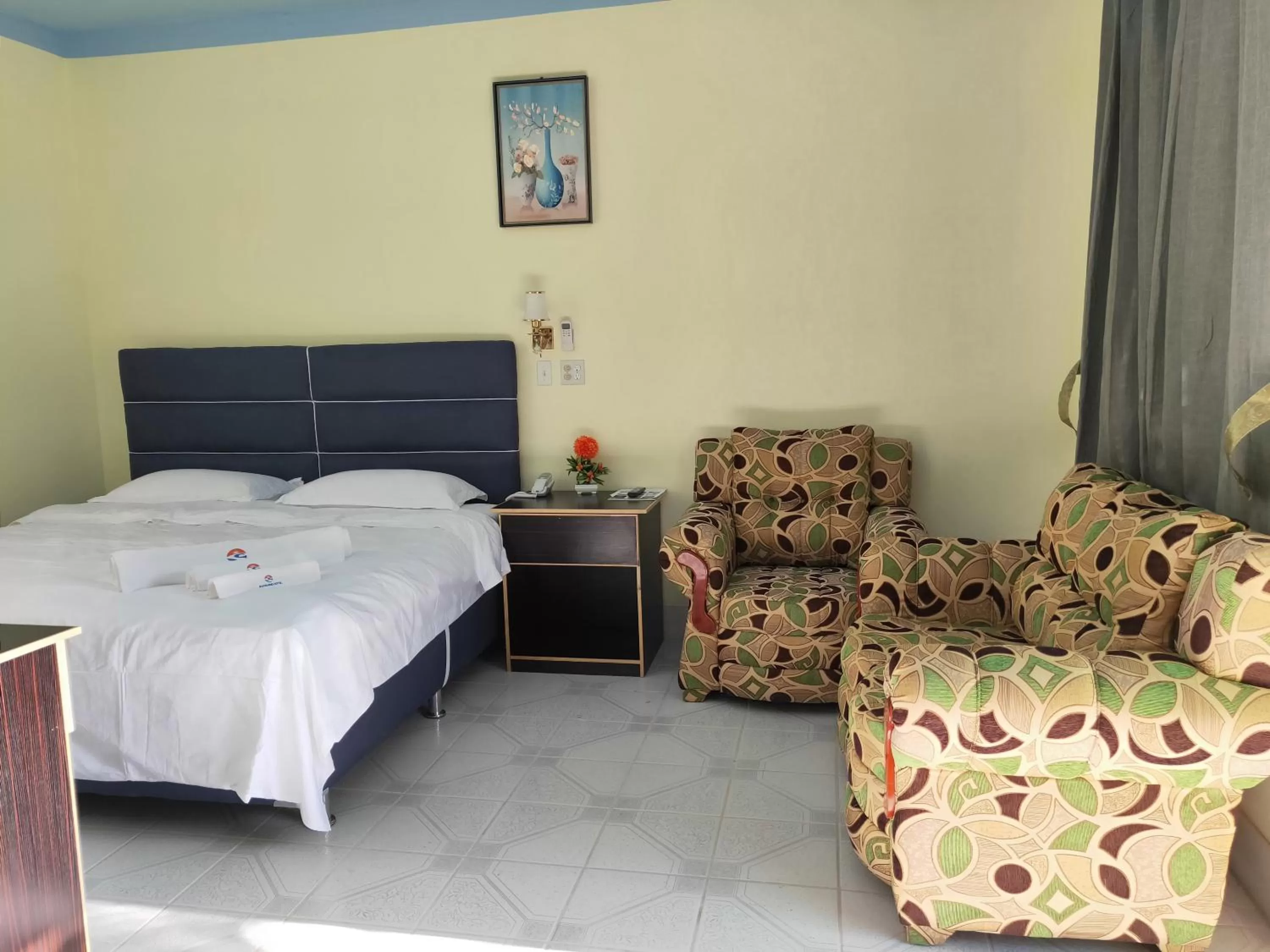 Bedroom, Bed in Sunshine View Hotel and Restaurant