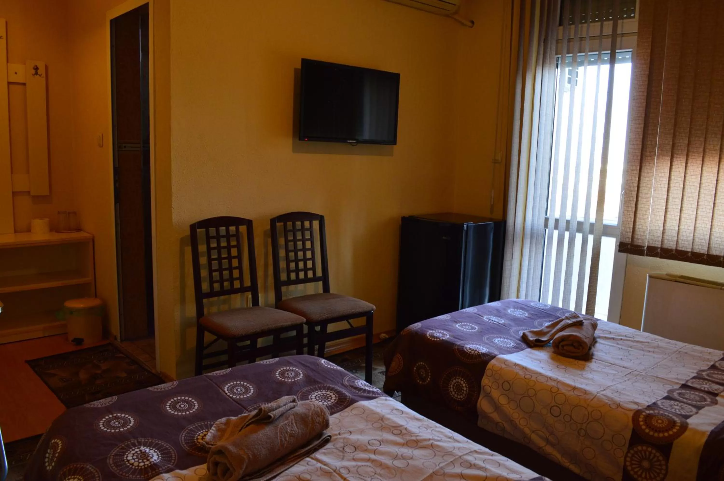 TV/Entertainment Center in Dionis Hotel