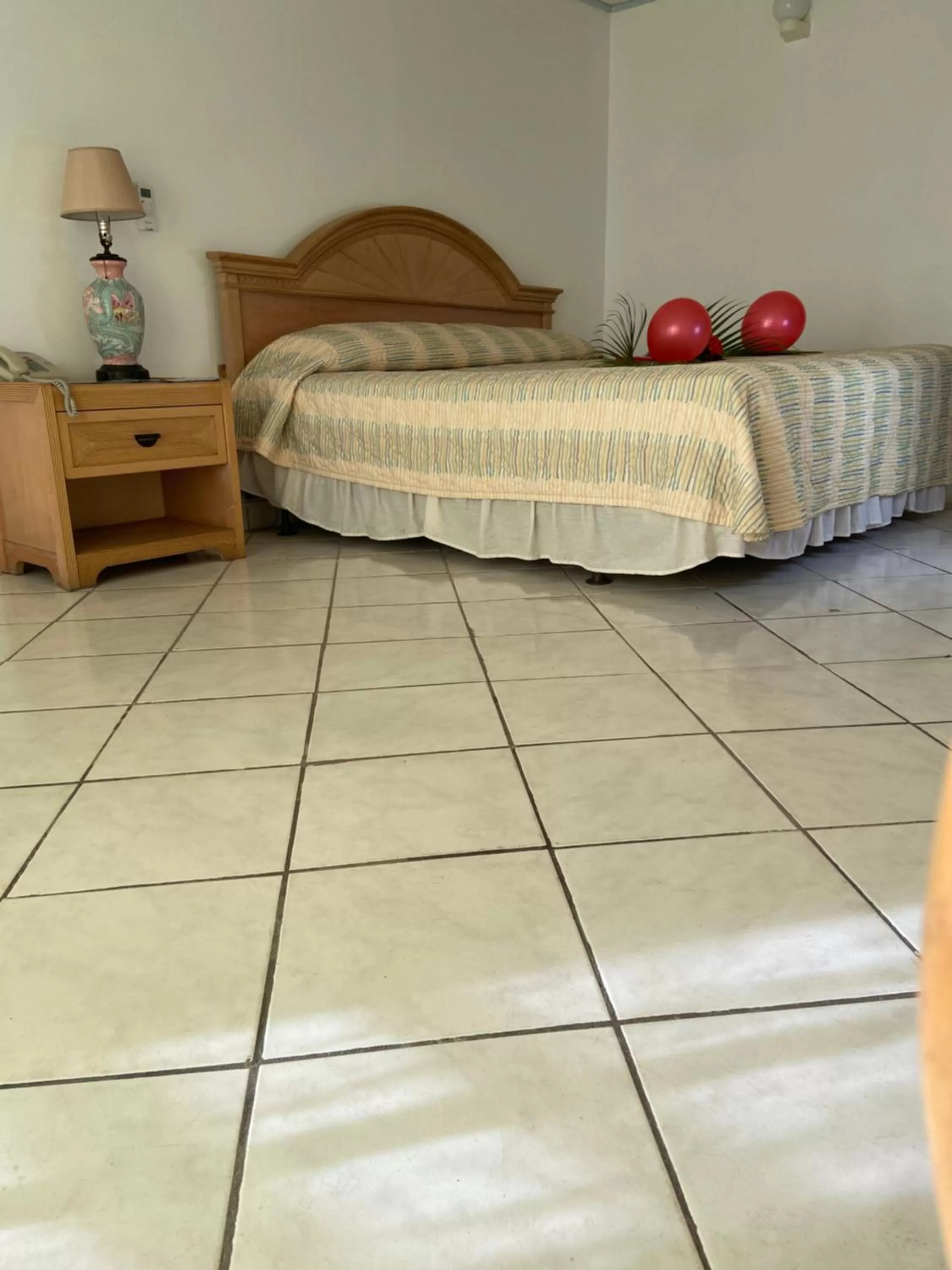 Bed in The Downtown Hotel