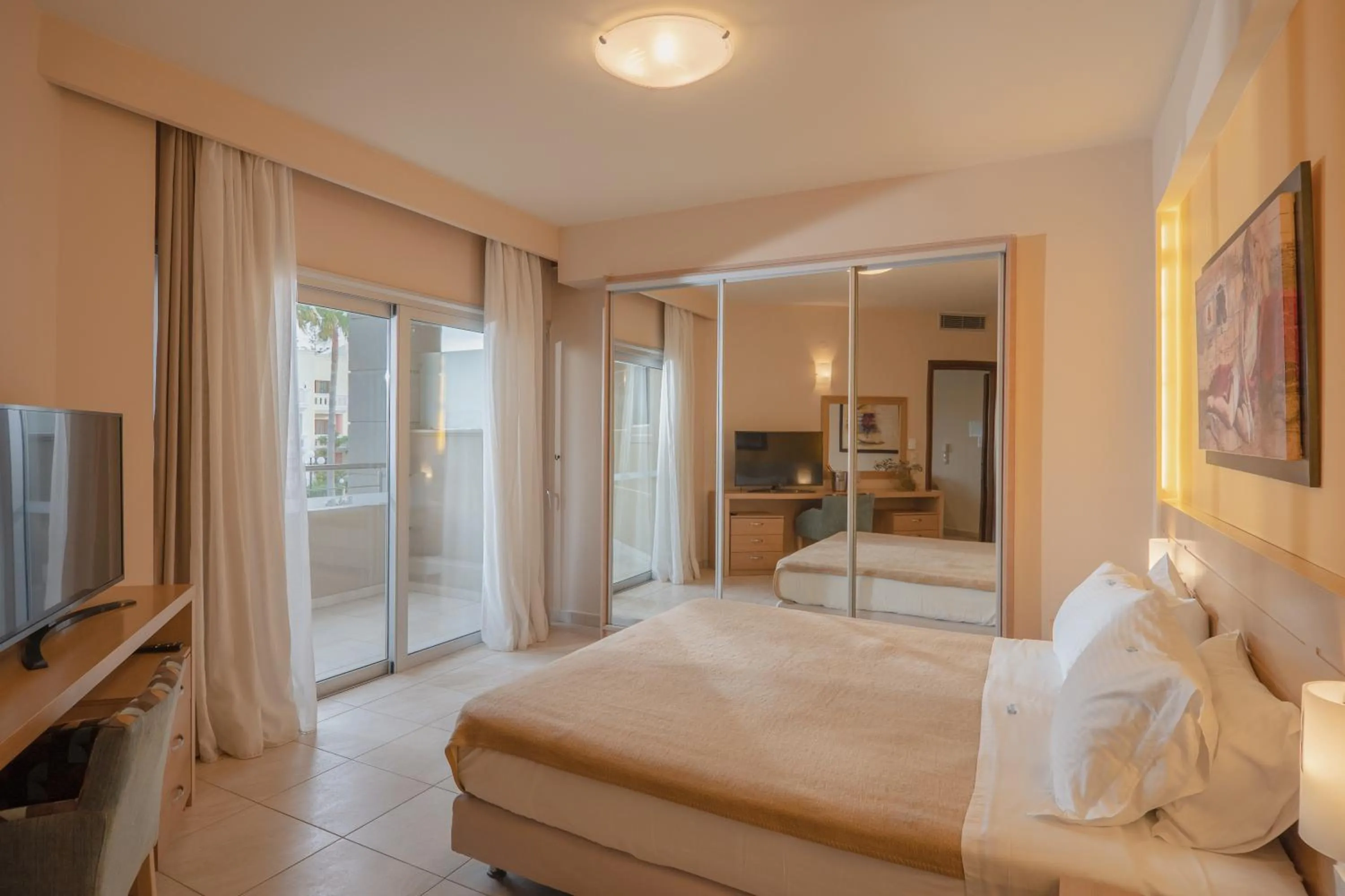 Living room, Bed in Molos Bay Hotel