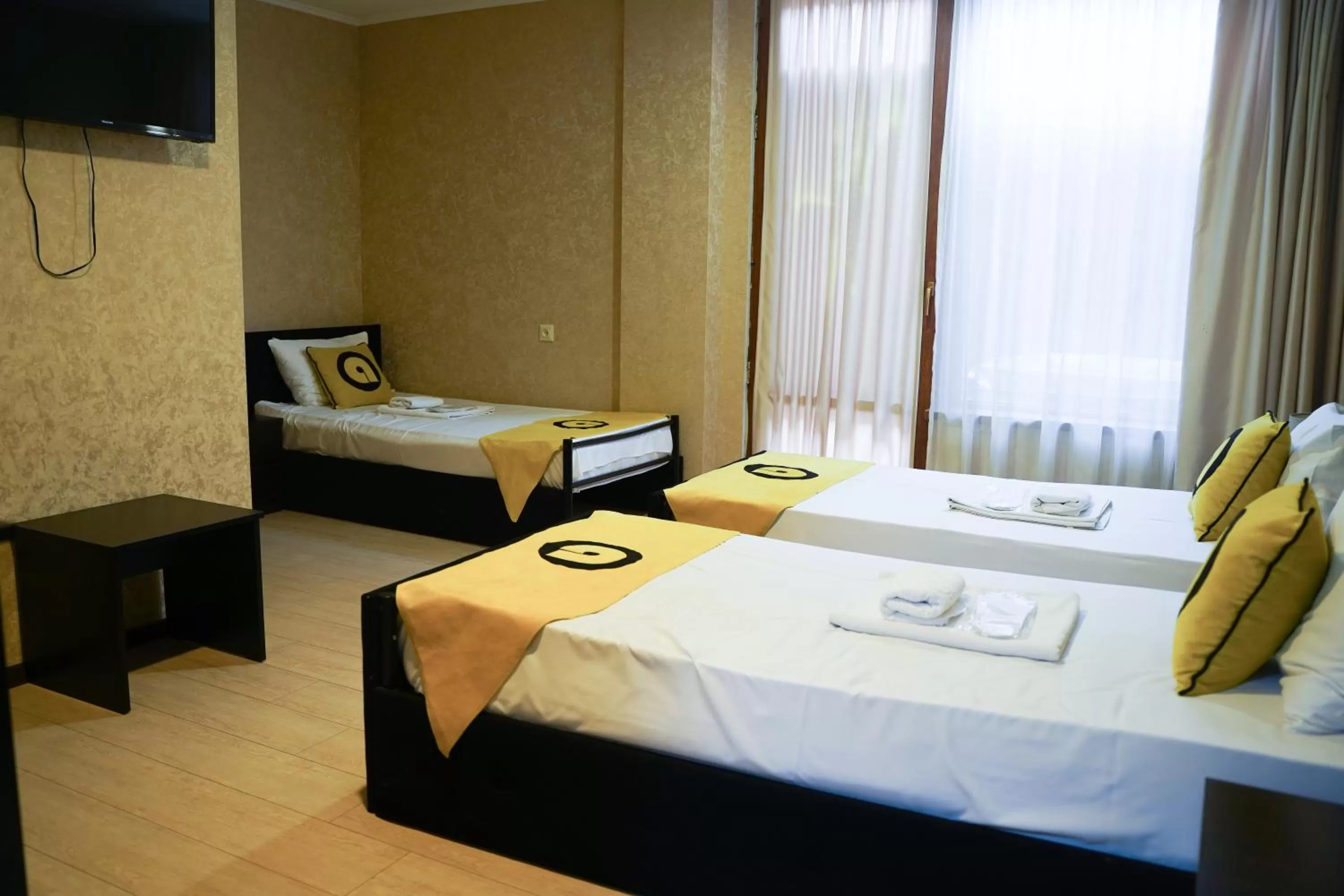 Photo of the whole room, Bed in Aura Plaza Hotel