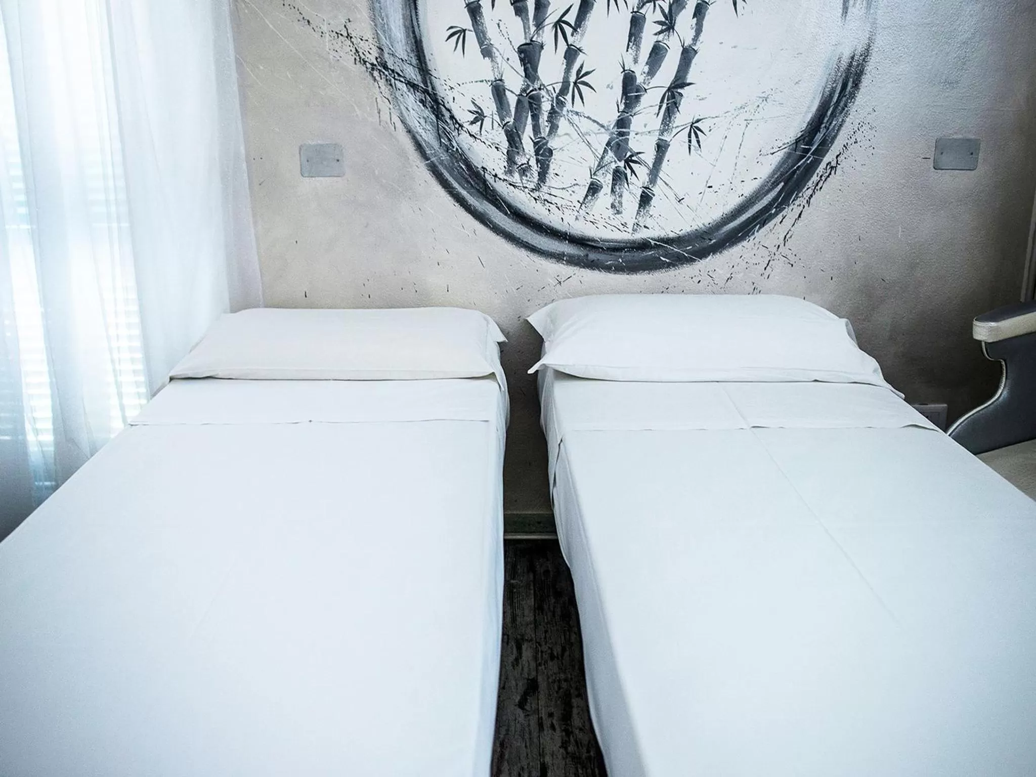 Bed in Hotel Butterfly