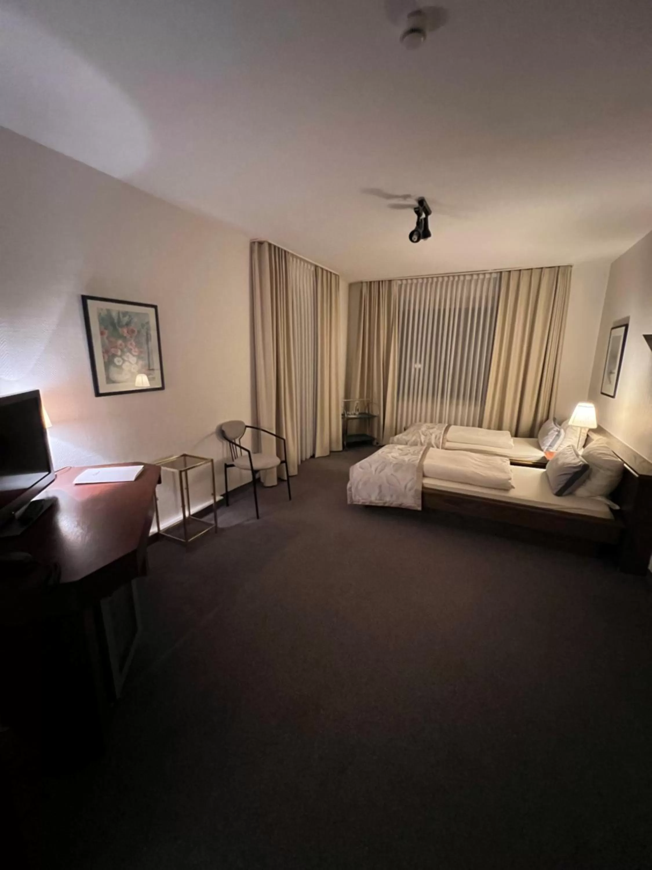 Bed in Hotel Exquisit