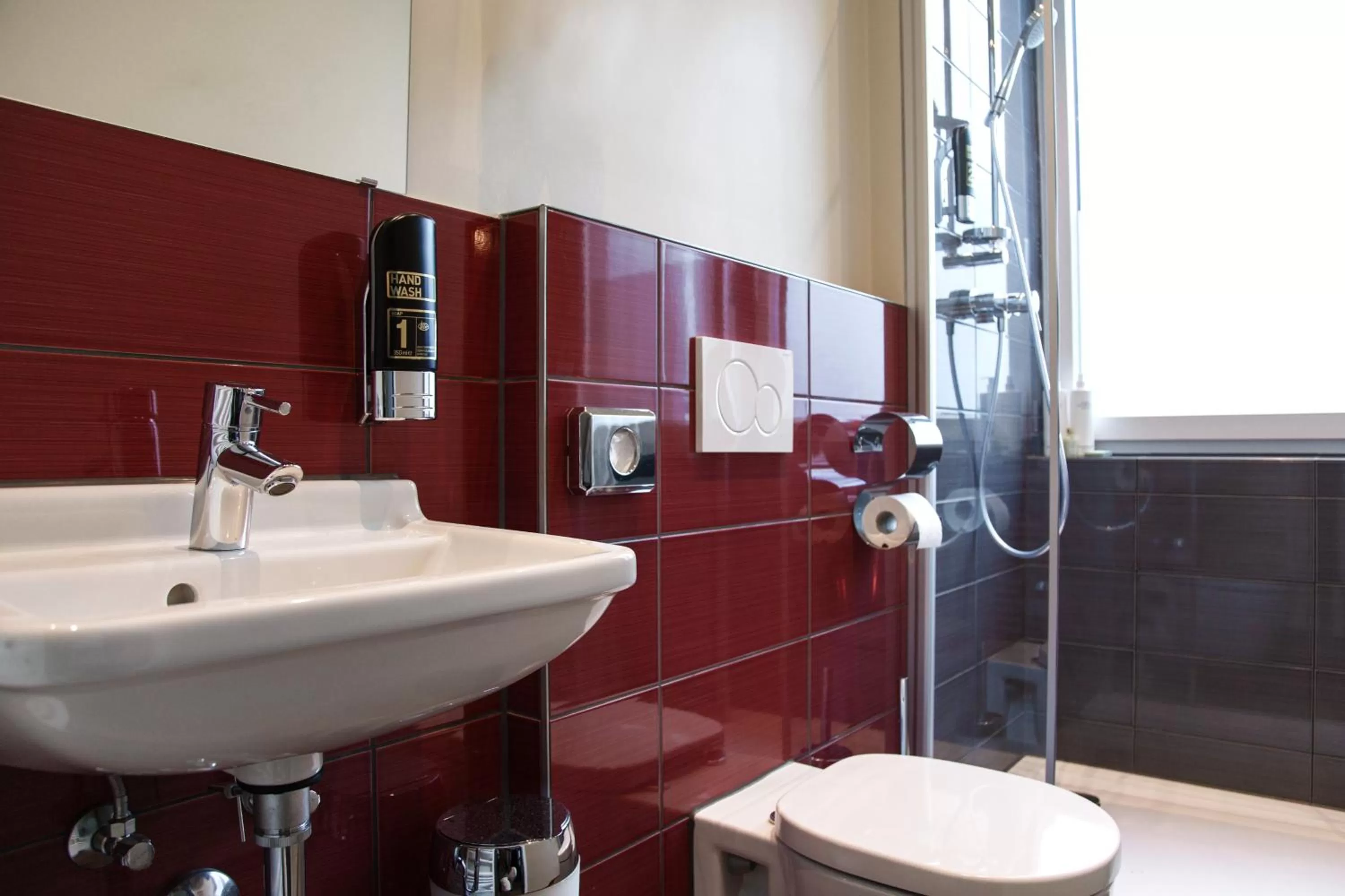 Bathroom in Base Apartments