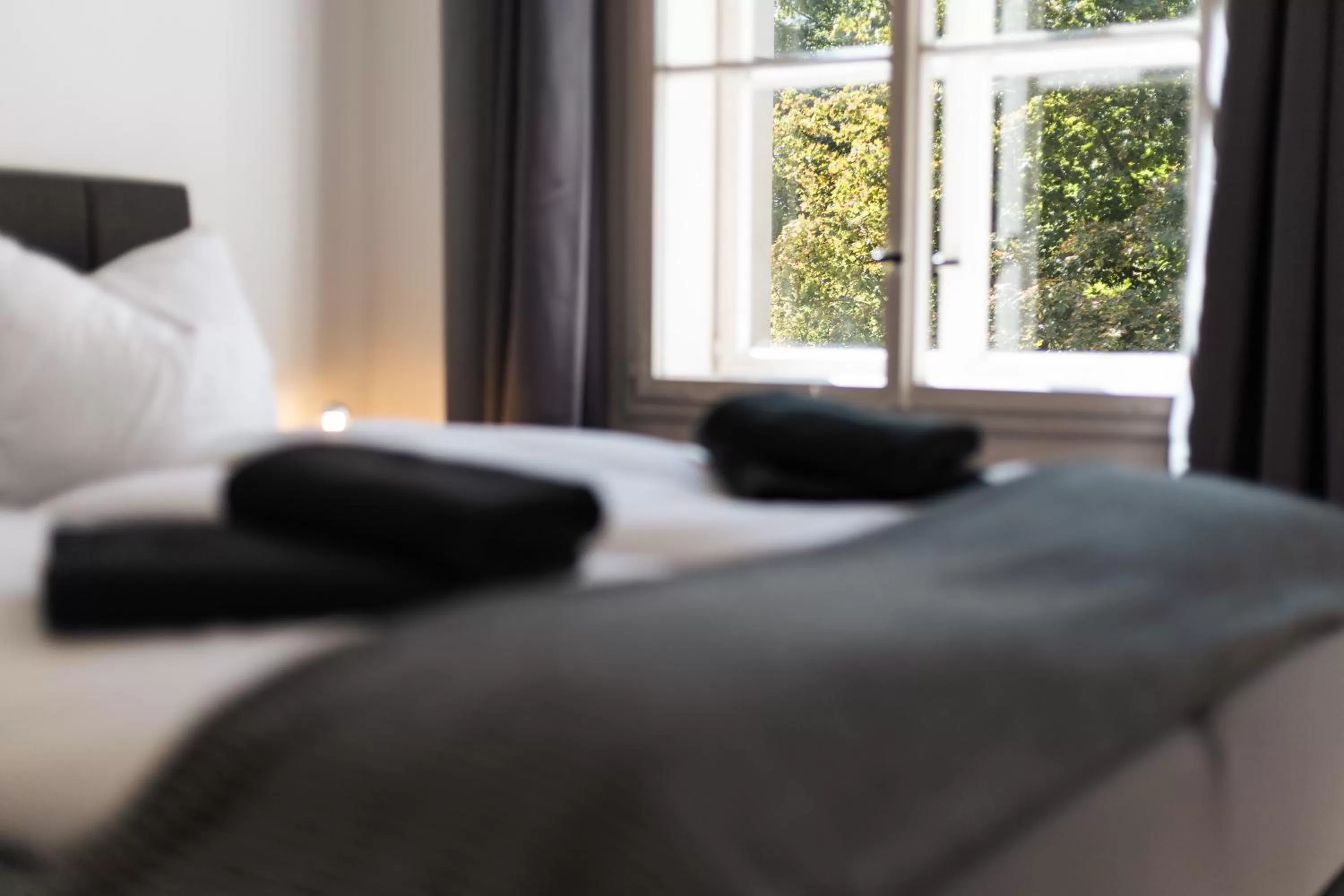 Bed in Ko-Living Space an der Oper - Street Art Design Apartments