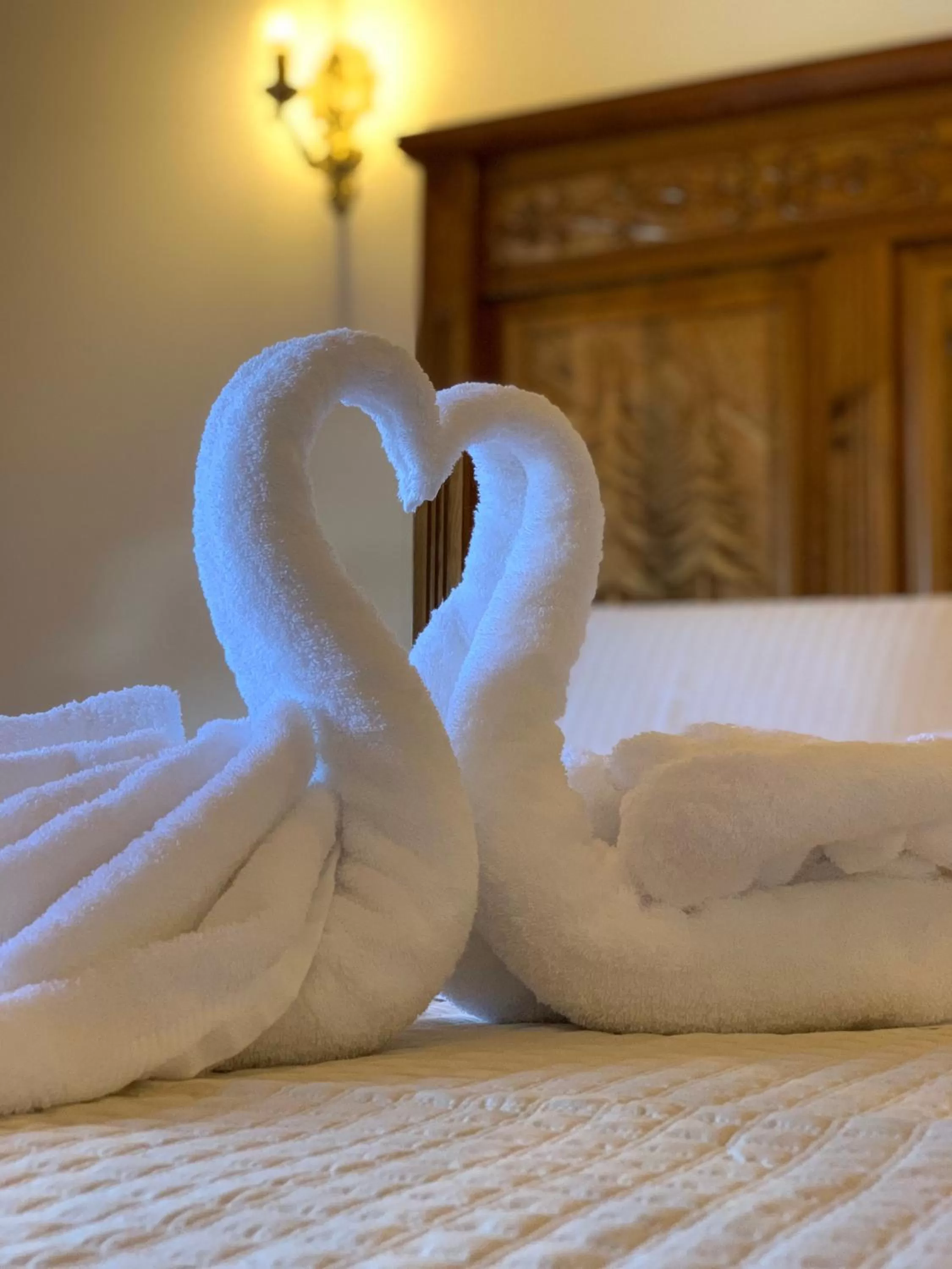 Bed in Rose Garden Hotel