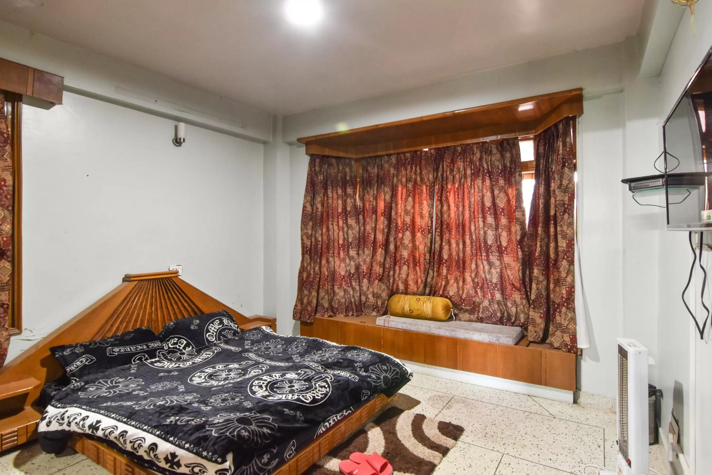 Bedroom, Bed in Dhanlaxmi Apartments