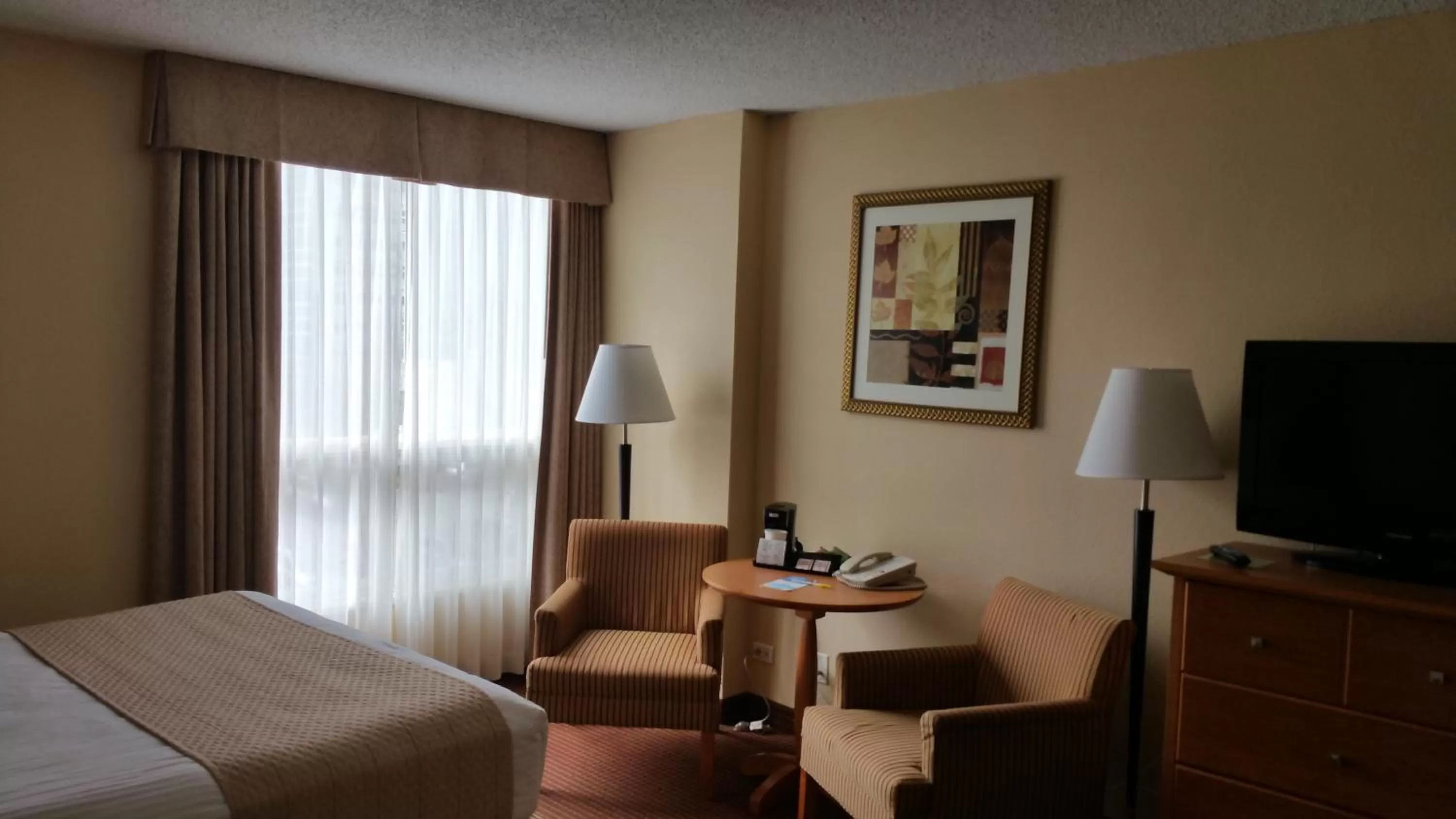 Seating area, Bed in Days Inn by Wyndham Edmonton Downtown