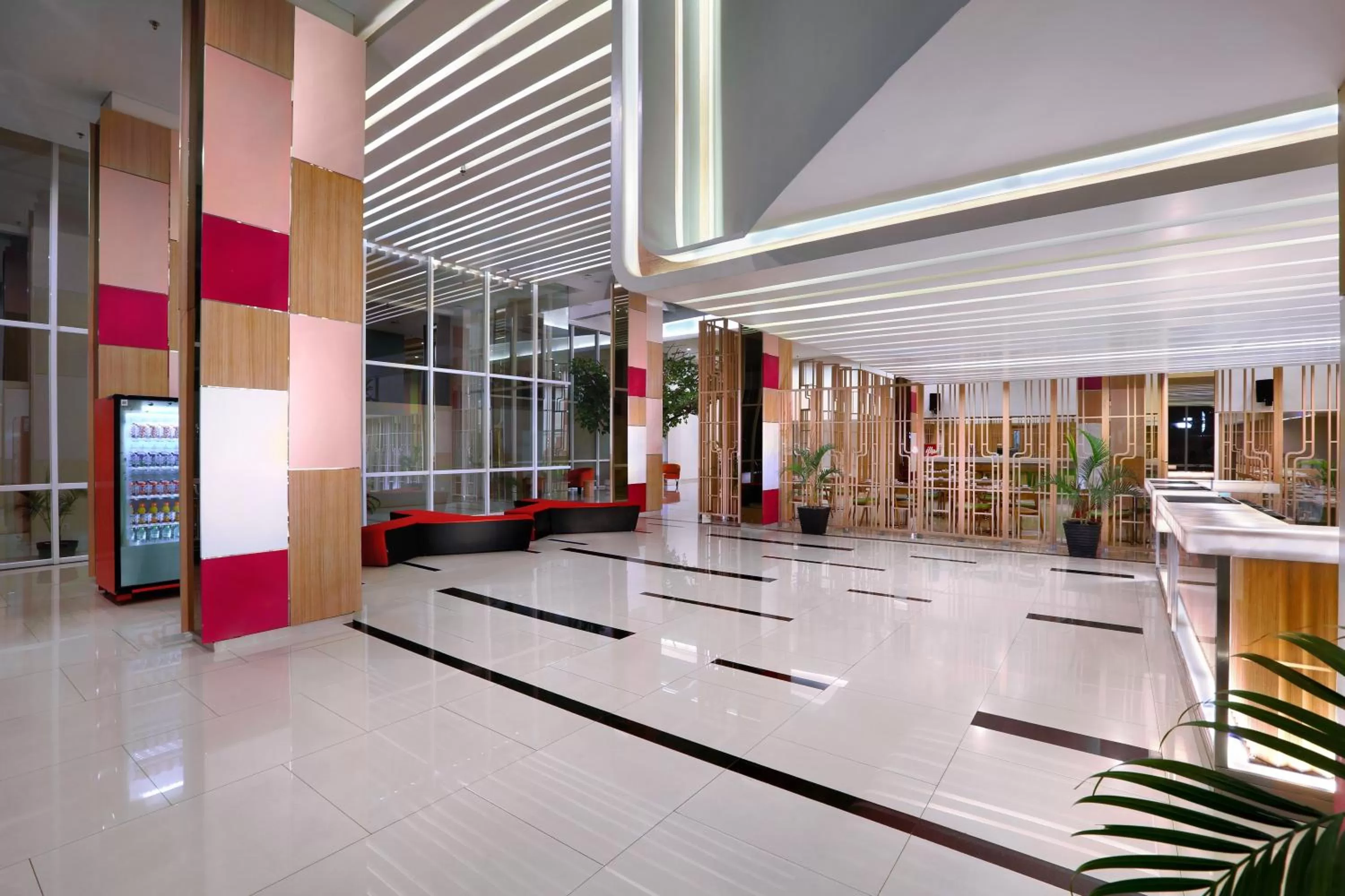 Lobby or reception in Fave Plus Hotel Palembang