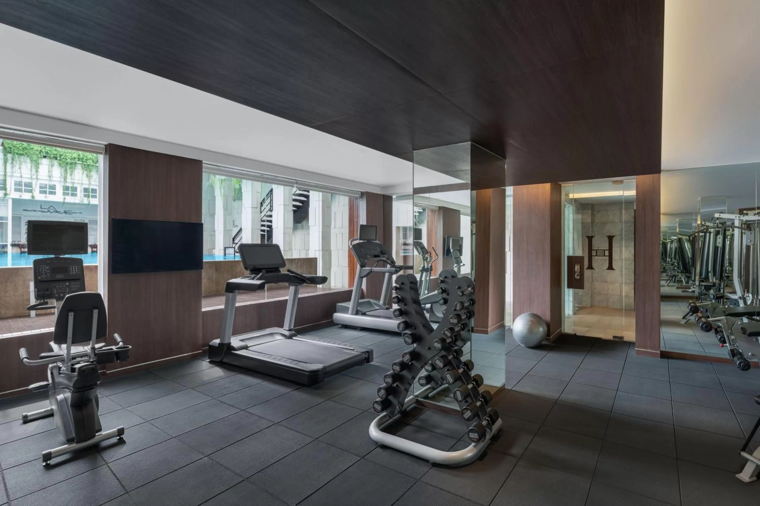 Fitness centre/facilities in The Hermitage, A Tribute Portfolio Hotel, Jakarta