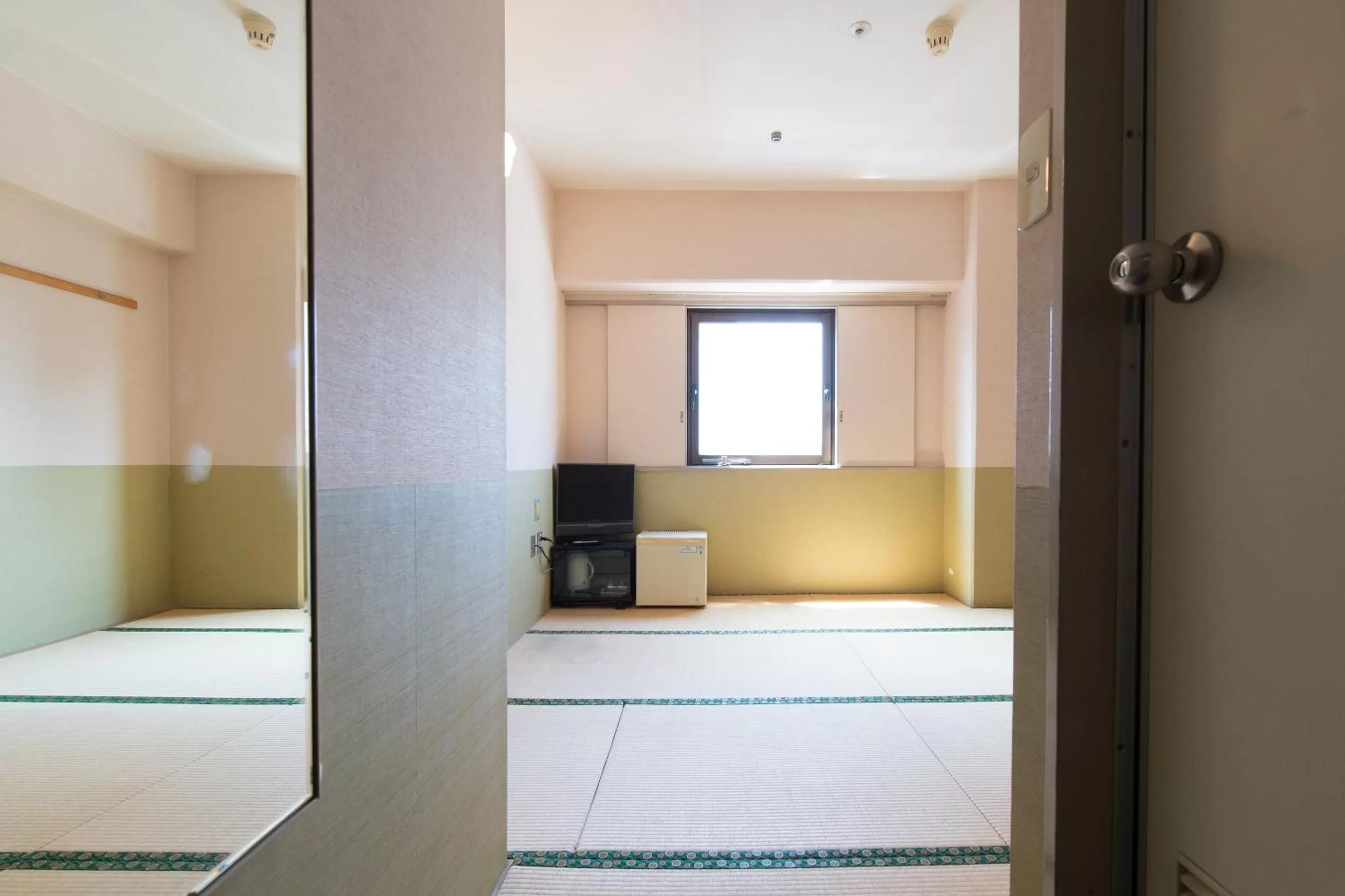 Photo of the whole room, Bed in Tabist Hotel Tetora Kitakyushu