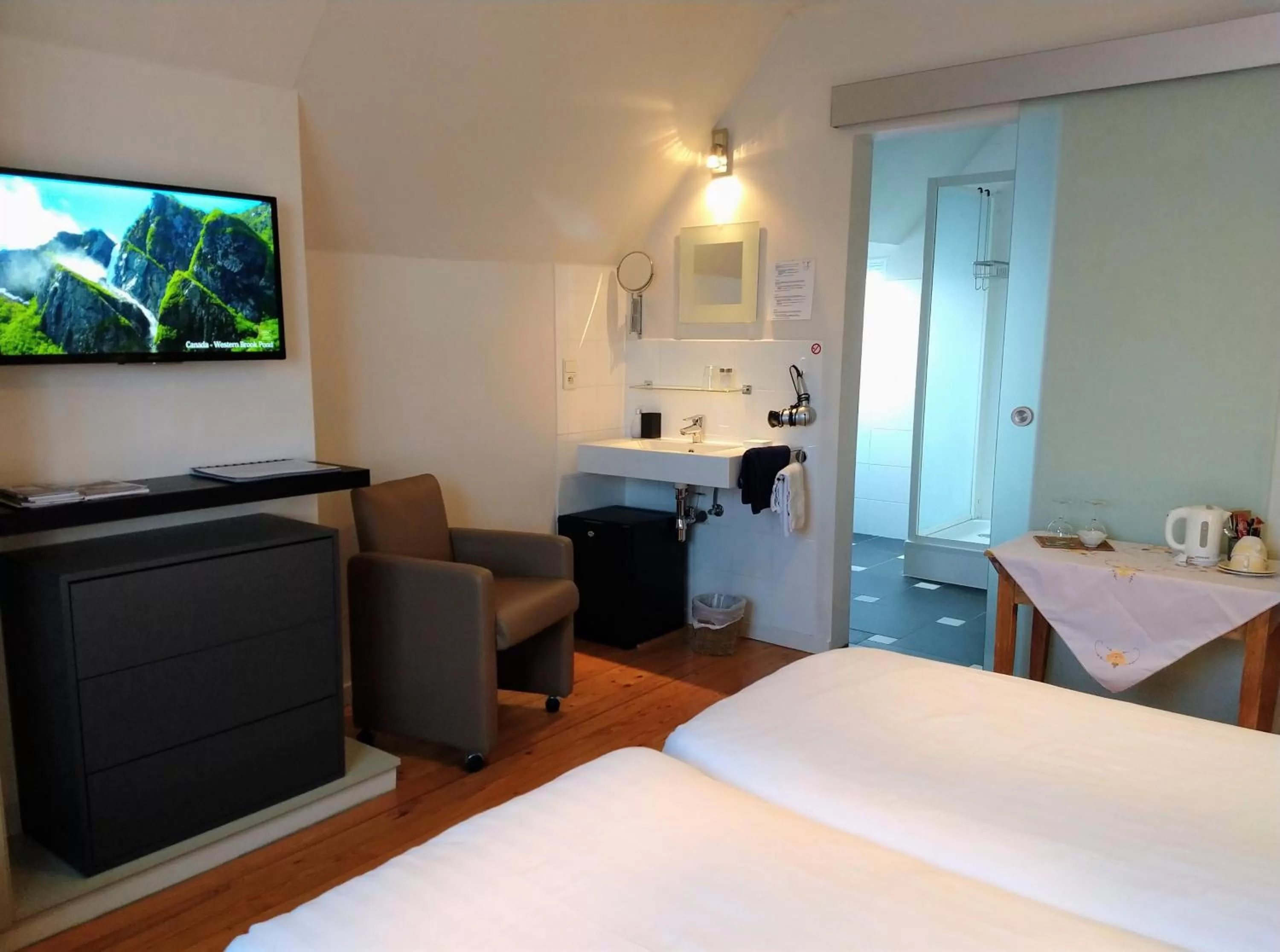 Bedroom, TV/Entertainment Center in B&B De Passant