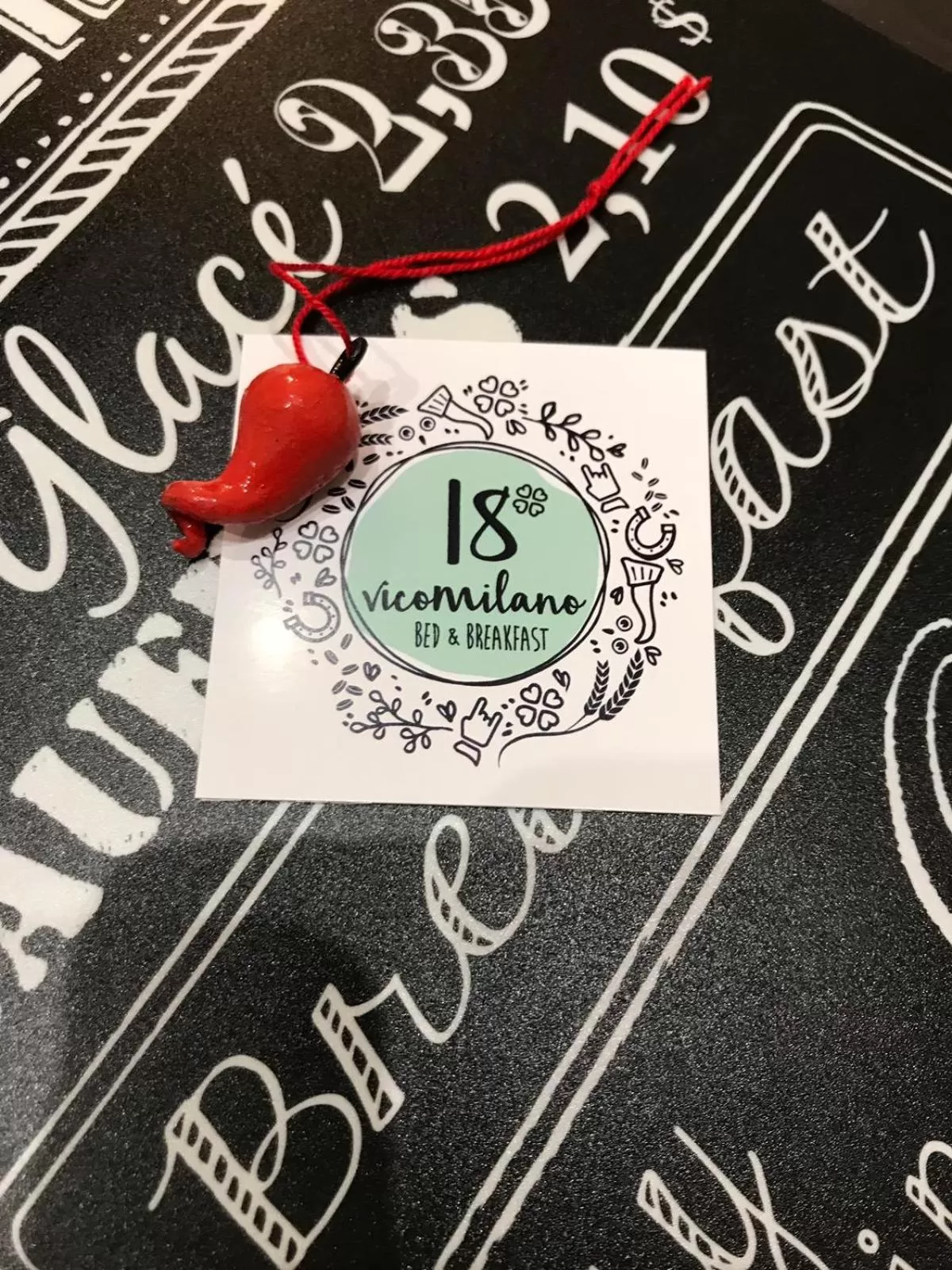 Property logo or sign in B&B Vico Milano 18