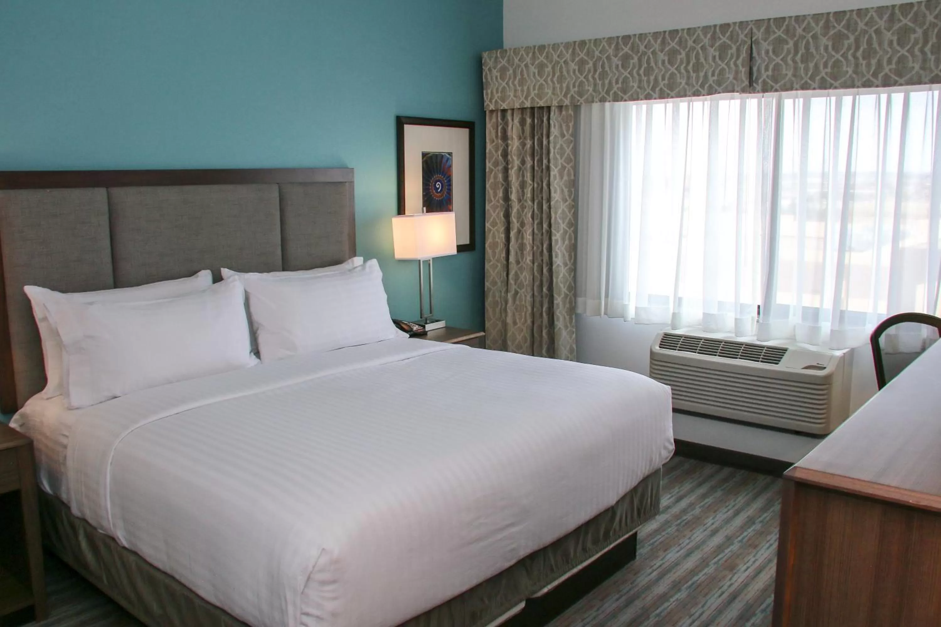 Photo of the whole room, Bed in Holiday Inn & Suites Denver Tech Center-Centennial by IHG