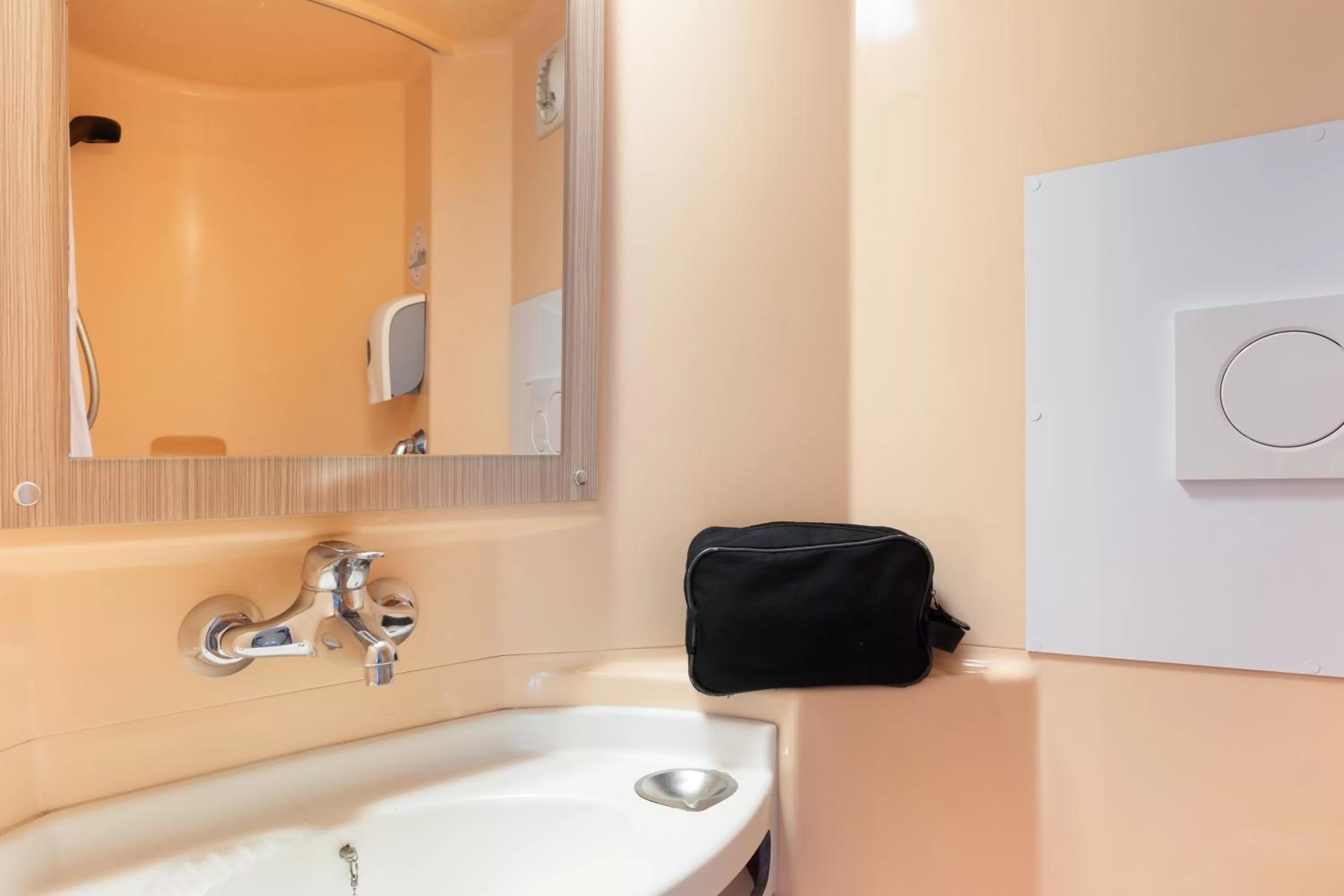 Bathroom in Premiere Classe La Ville Du Bois