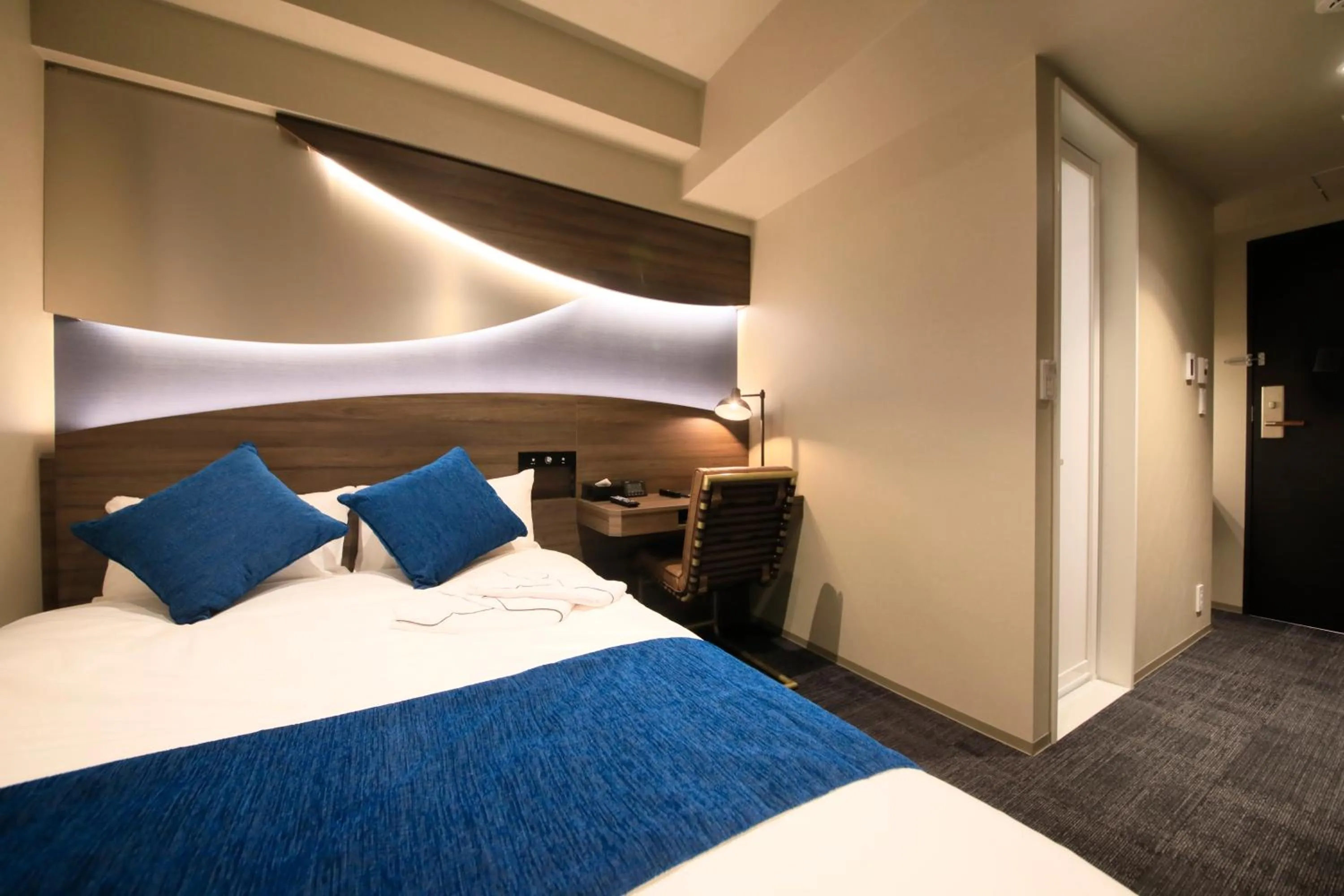 Bed in Quintessa Hotel Tokyo Ginza