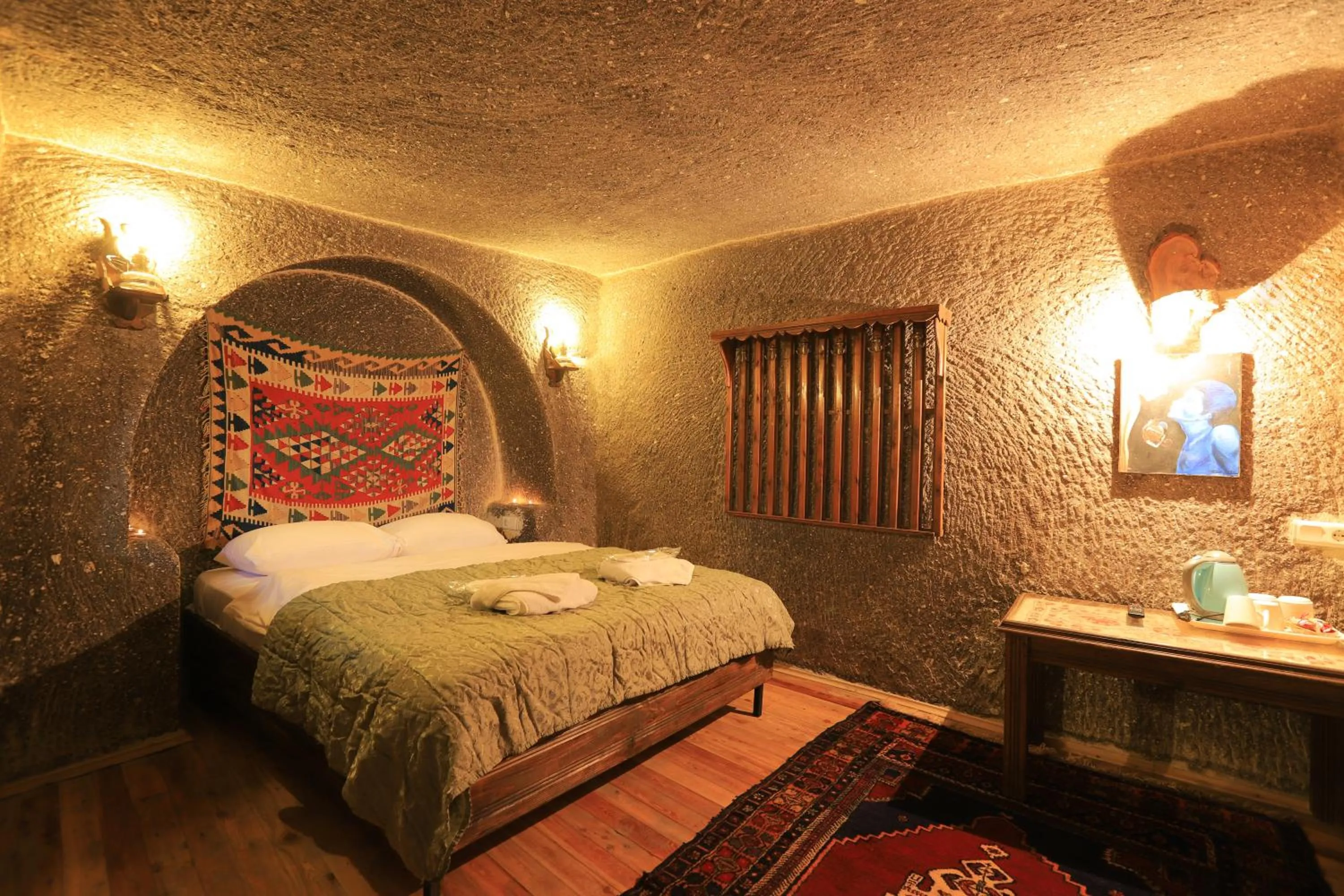 Property building, Bed in Antique Terrace Cave Suites