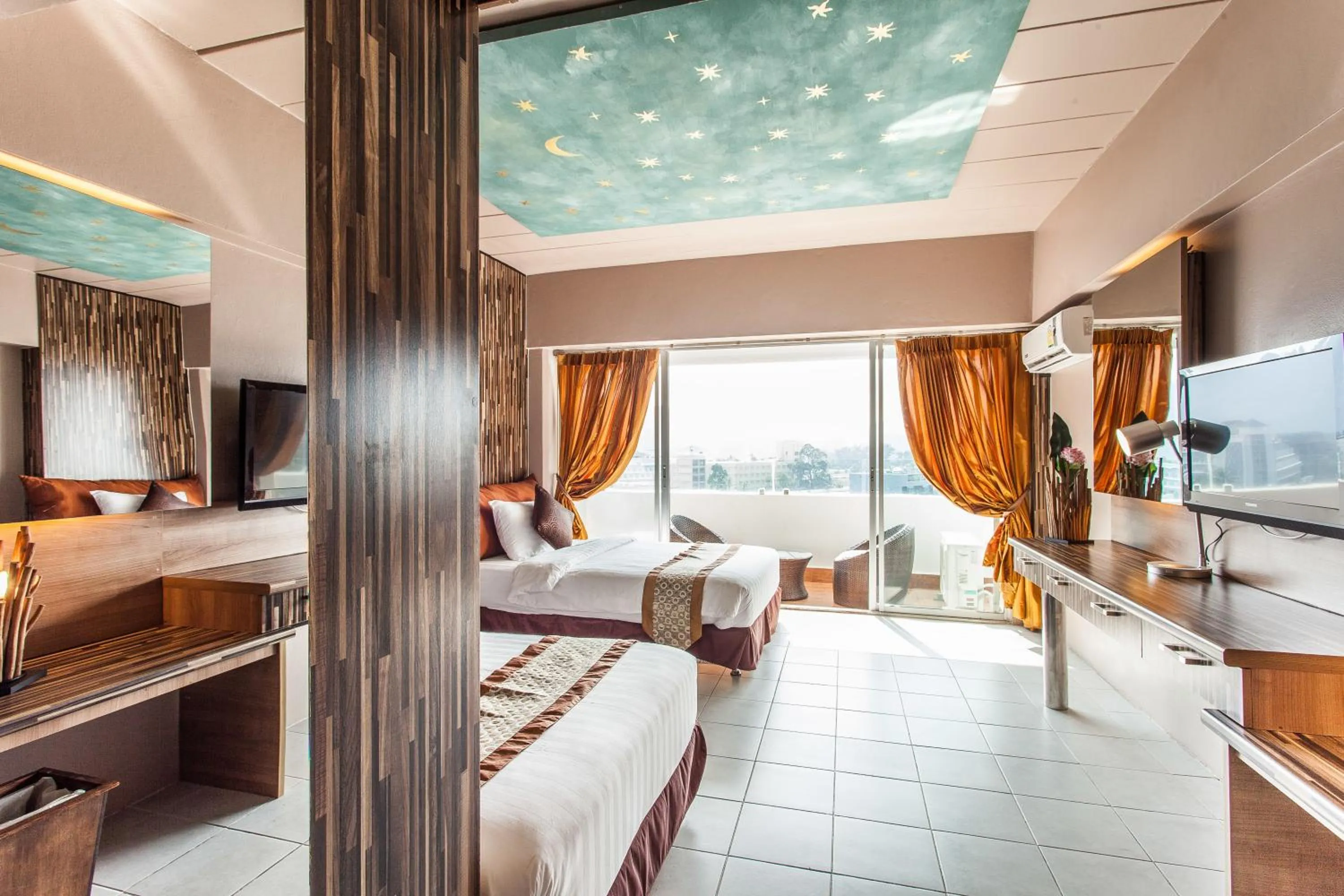 Bedroom in Patong Heritage Hotel Phuket - SHA Extra Plus