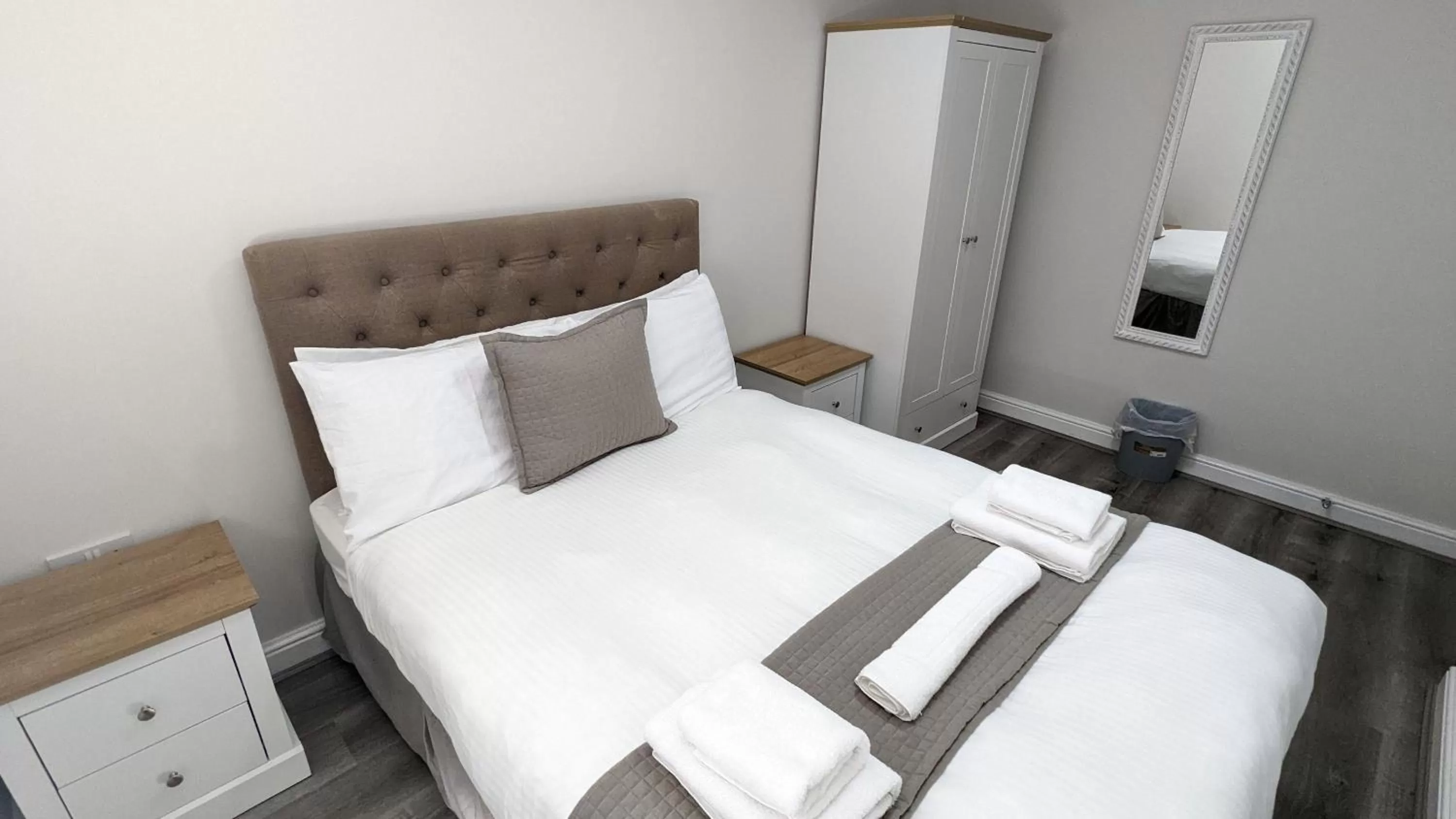 Bed in Cocoon @ International Inn + Apartments