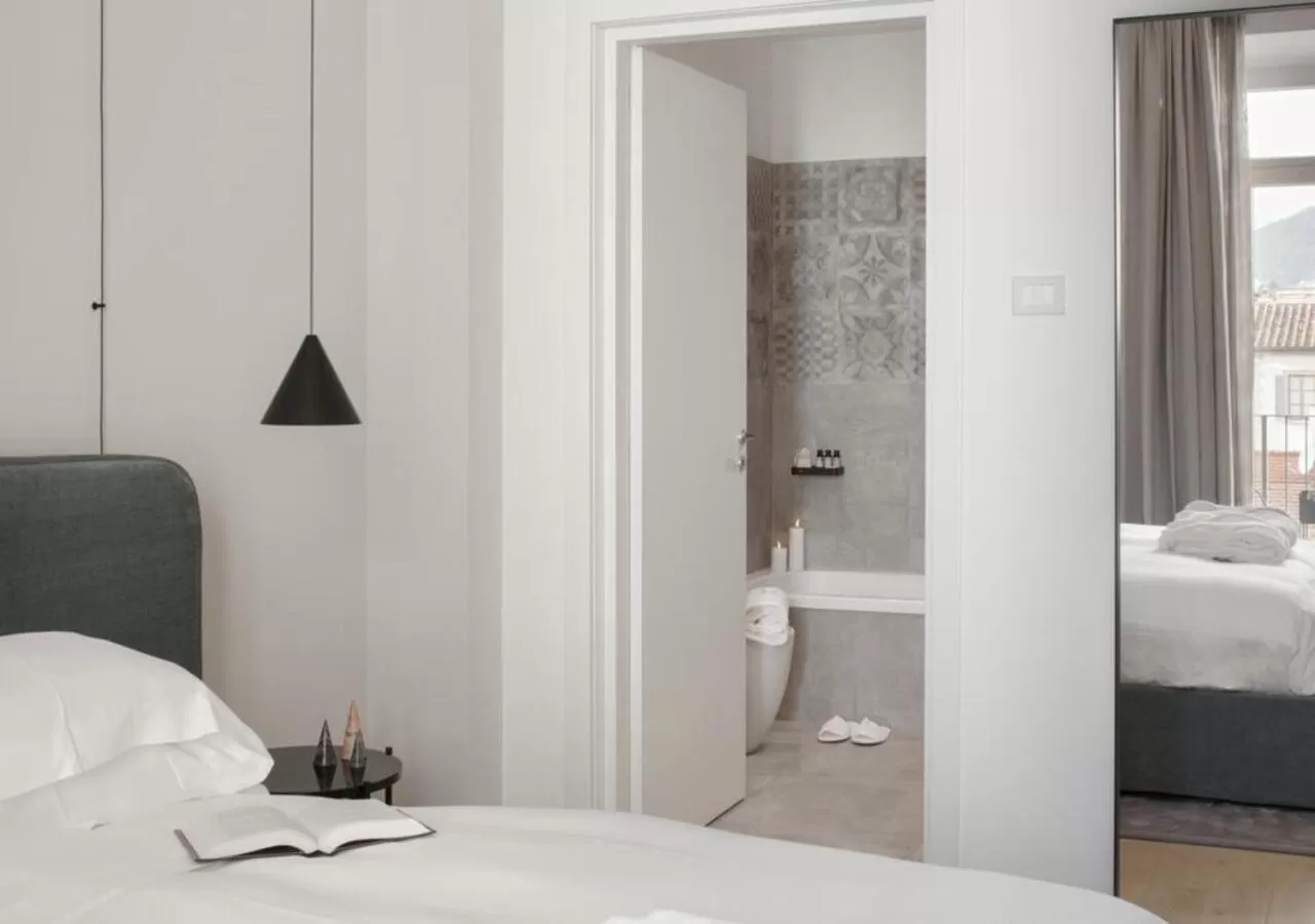 Bed in BB Hotels Aparthotel Collection Il Michelangelo