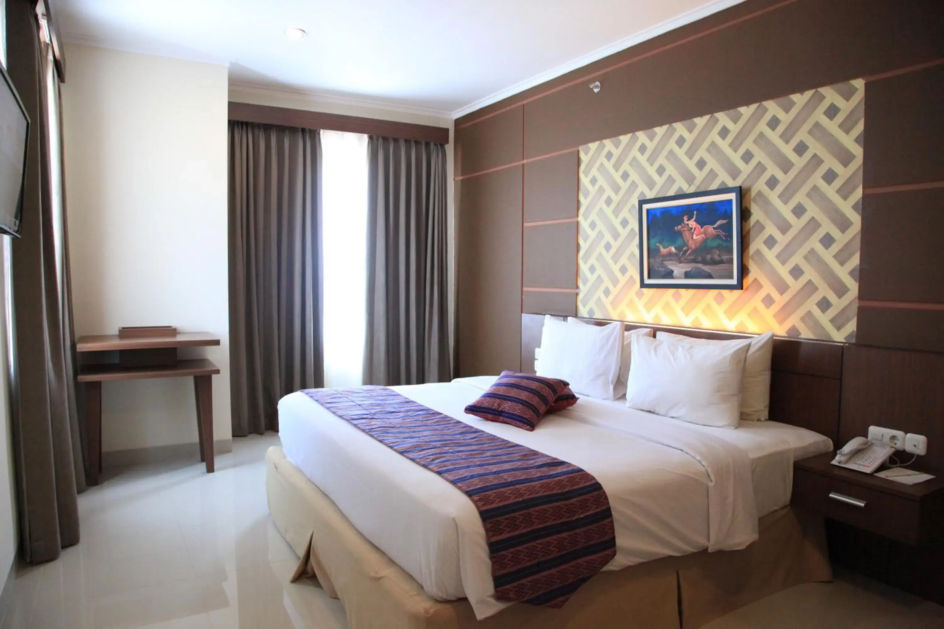 Executive Double Room in Aerotel Smile Losari Executive Double Room in Aerotel Smile Losari