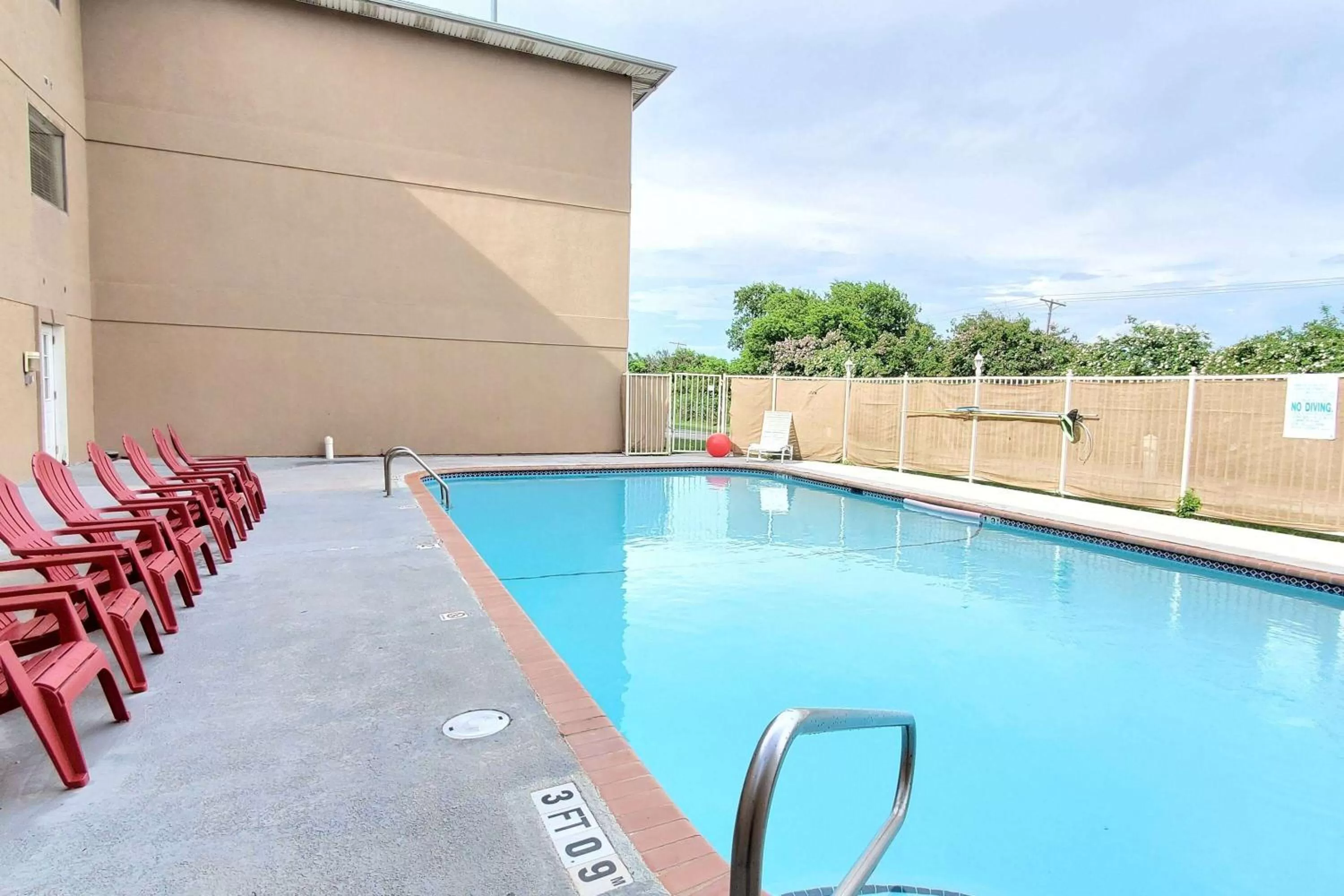 Pool view in Super 8 by Wyndham Temple I-35
