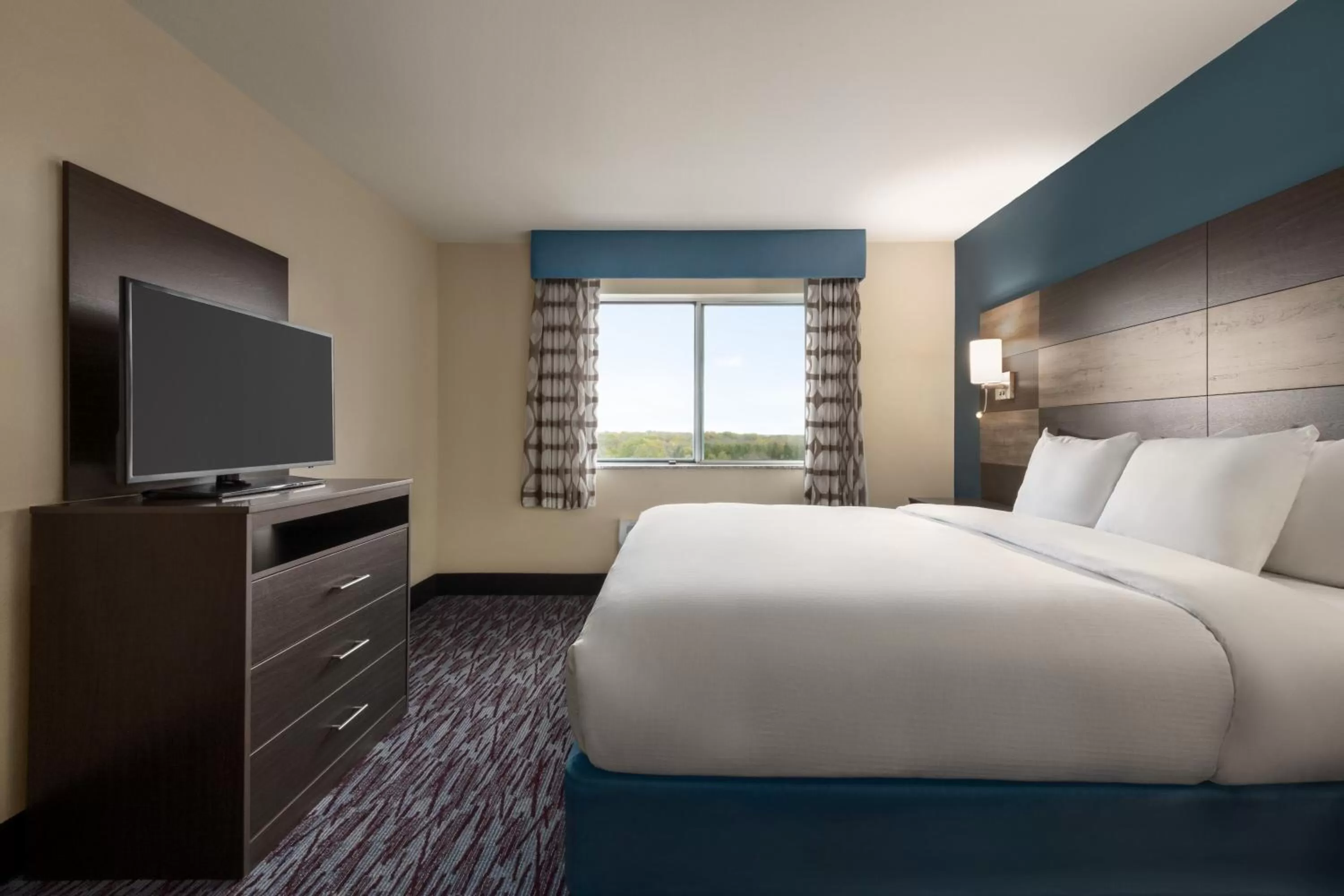 Guests, Bed in AmericInn by Wyndham Dodgeville