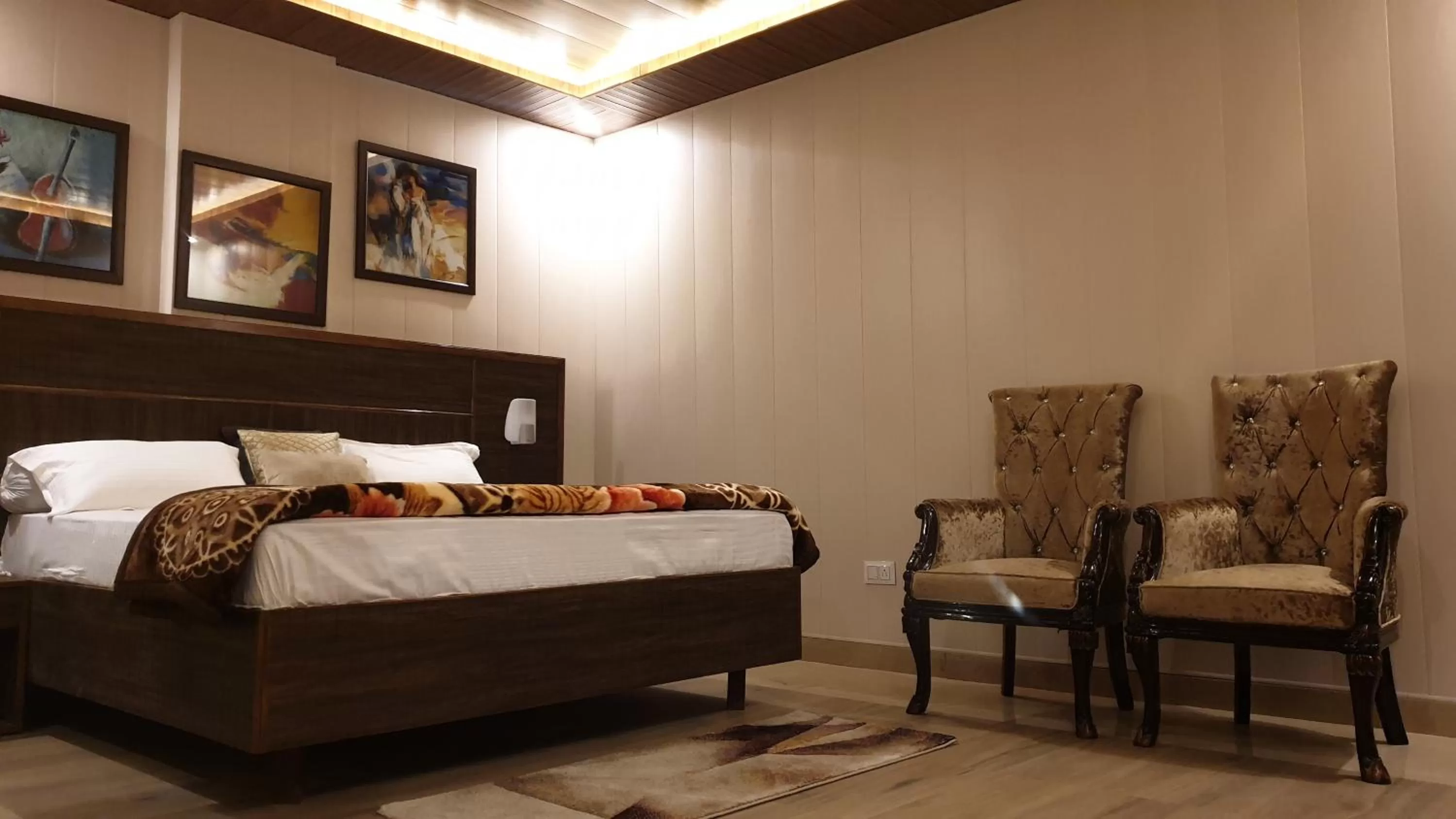 Bed in Maple Leaf Hotel