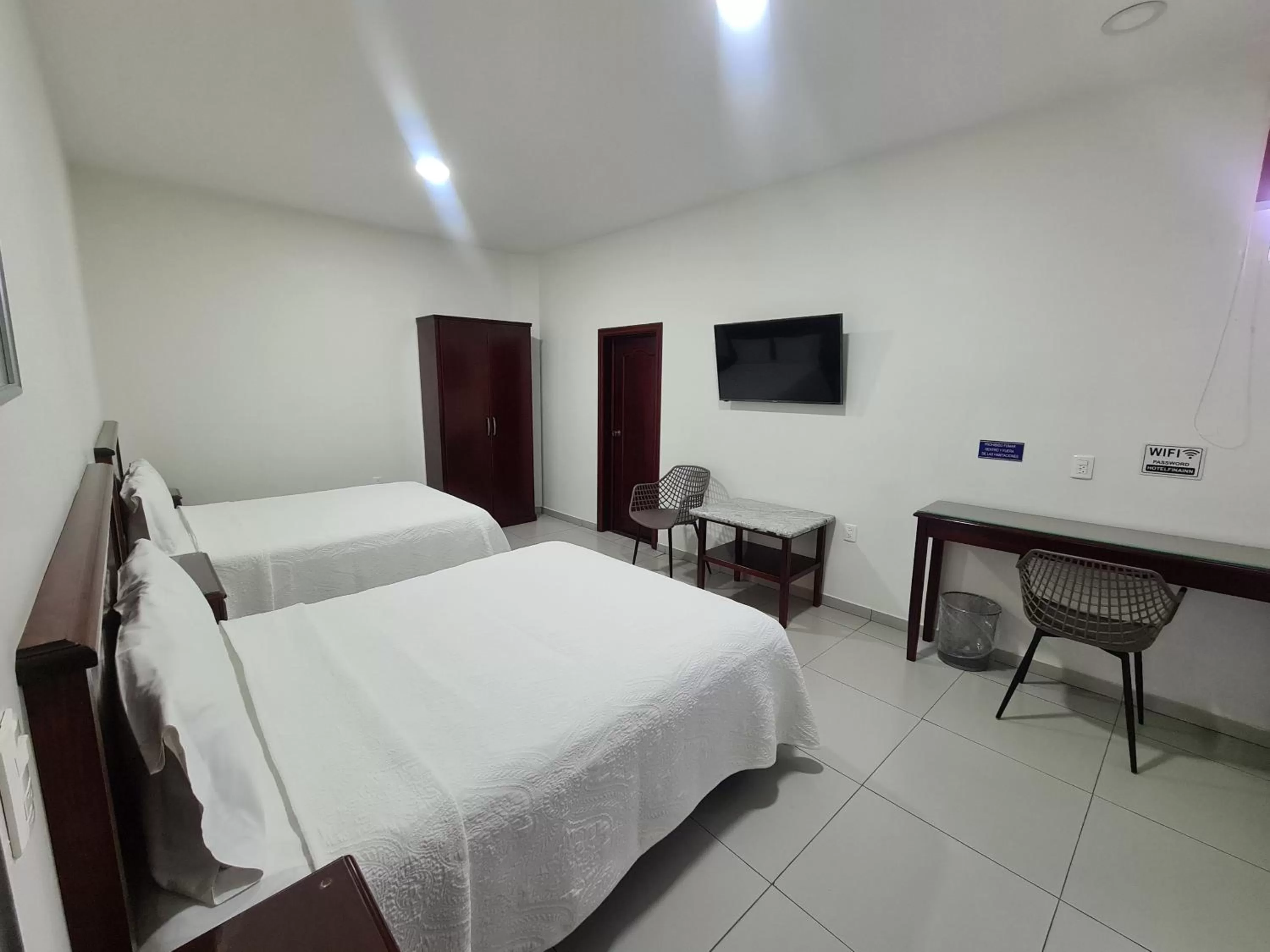 Bed in HOTEL FINA INN