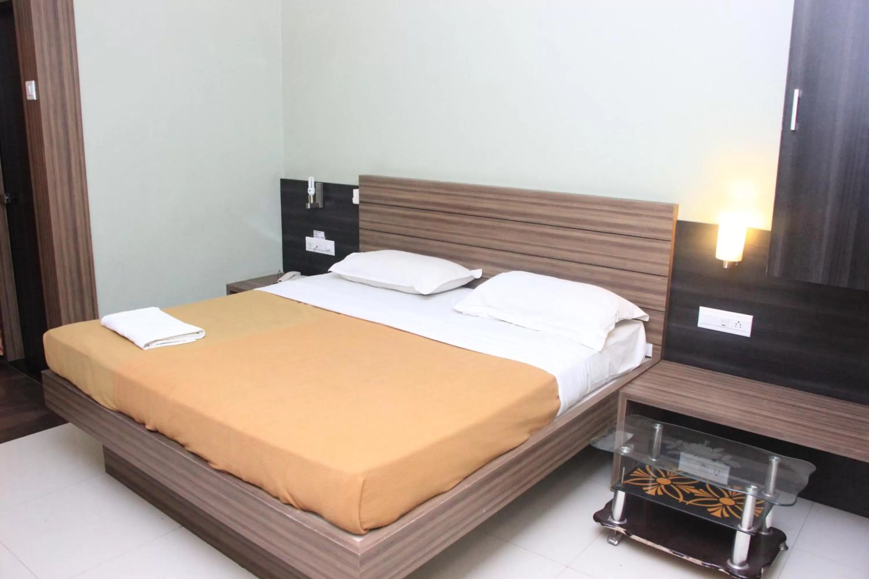 Bedroom in Hotel Sham Suman, Kolhapur- Opposite To Mahalaxmi Temple