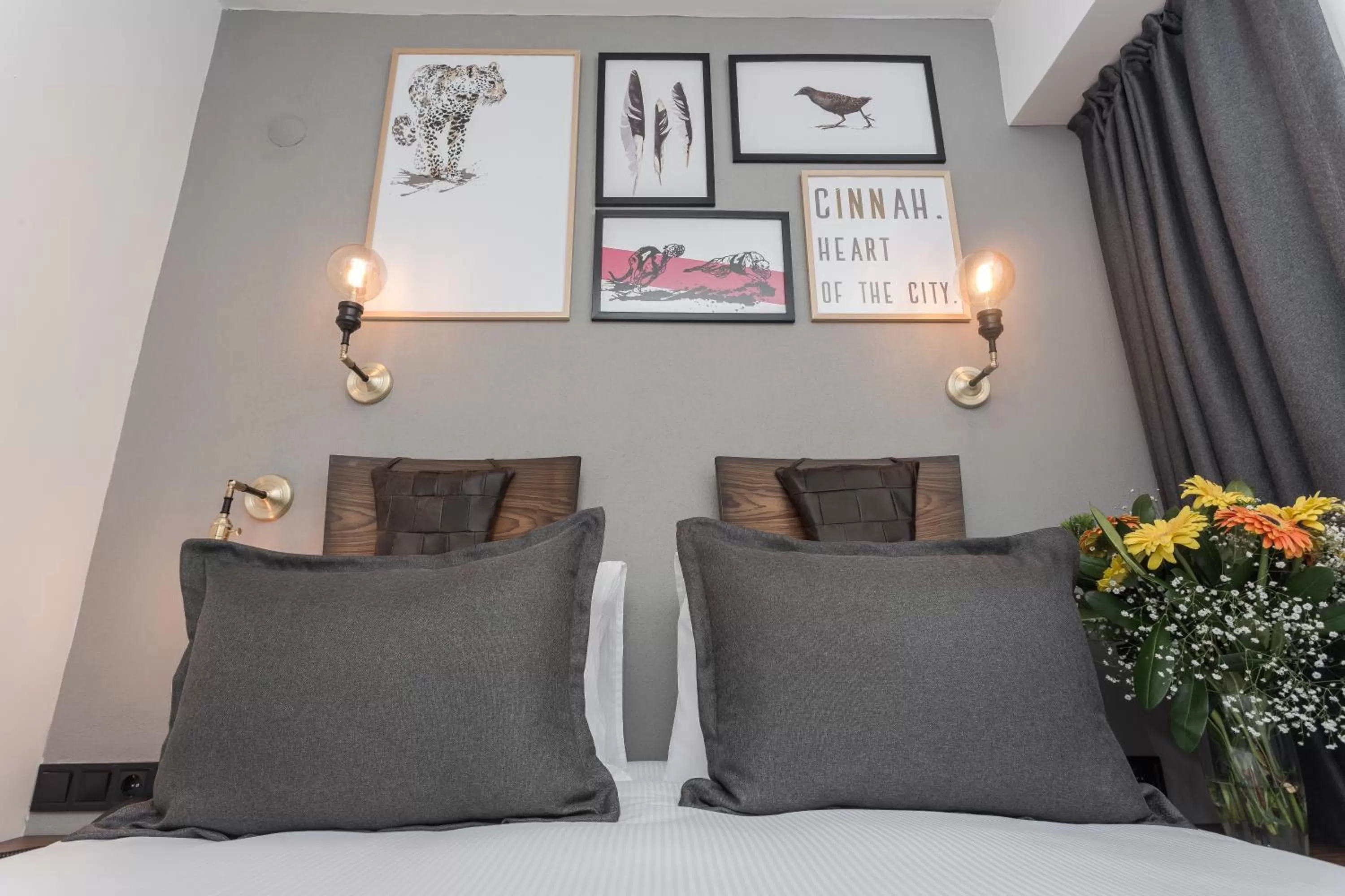 Bed, Seating Area in Hotel Cinnah