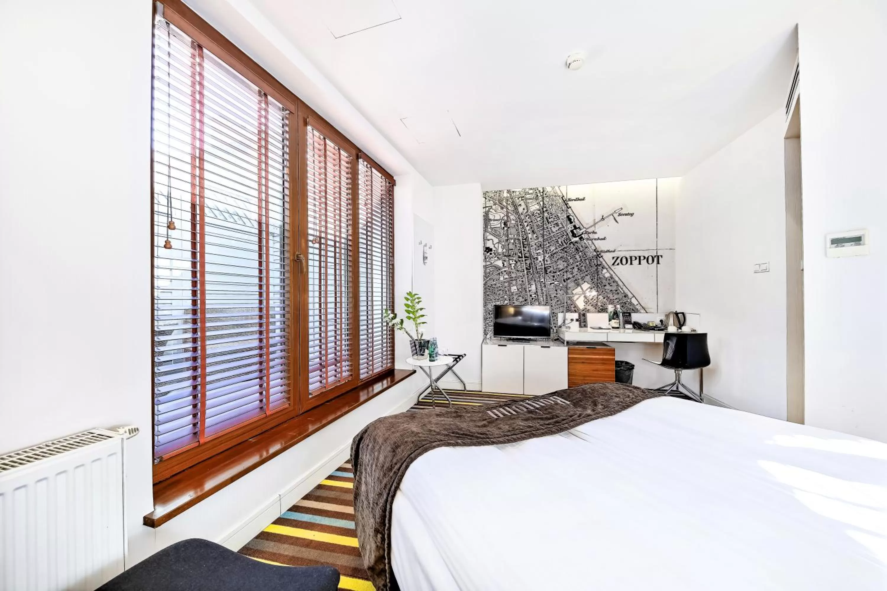 Bed in Bayjonn Boutique Hotel