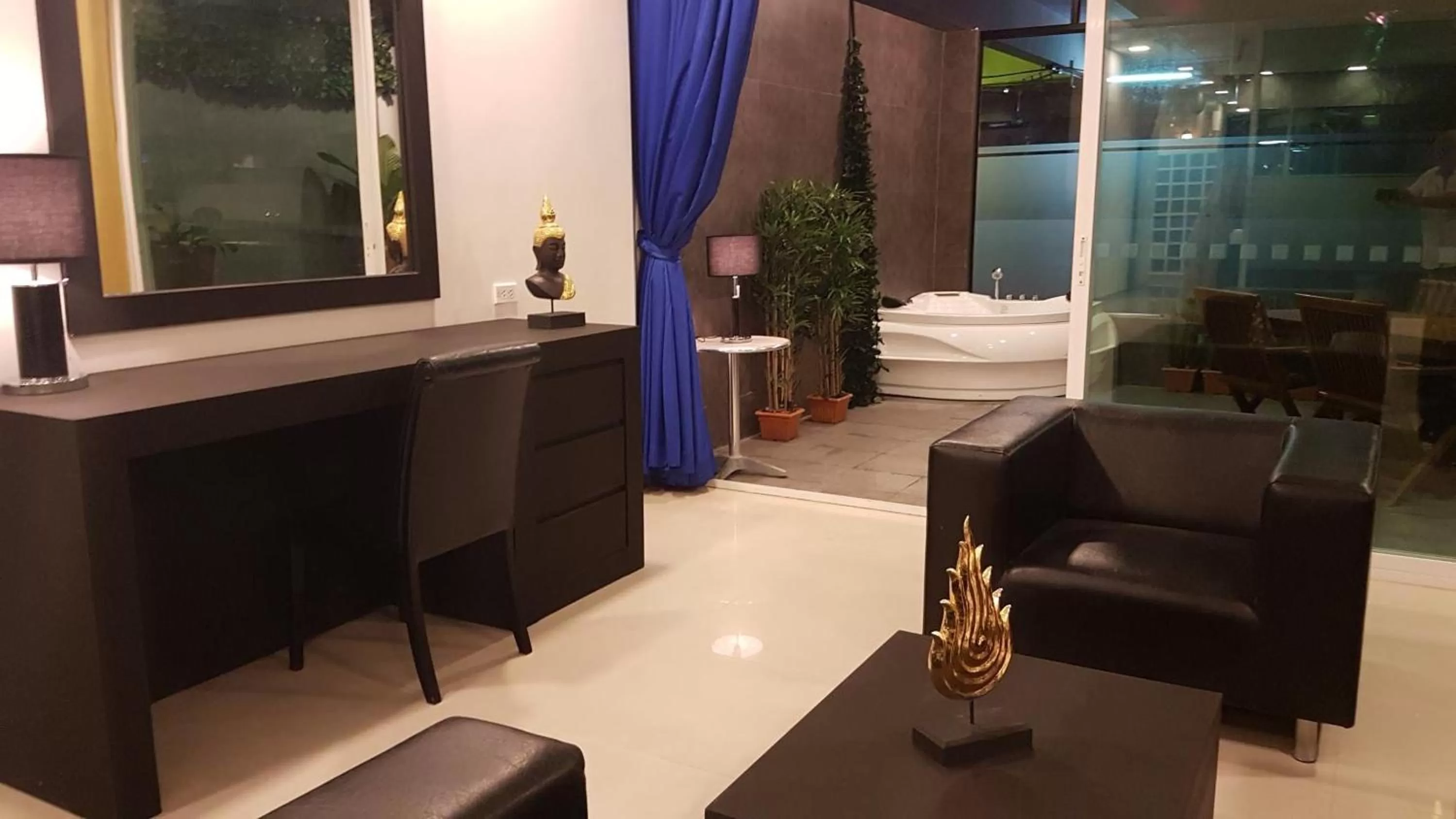 Photo of the whole room, Bed in East Suites